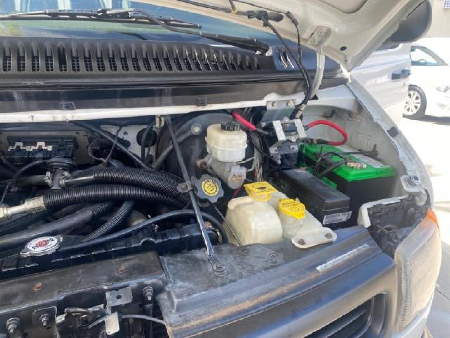 2002 Bright White /Dark Slate Gray Dodge Ram Van LOW MILES 61,263 HIGH TOP CONVERSION (2B7LB31Z42K) with an 5.9L MPI V8 Magnum Engine engine, Automatic transmission, located at 4701 North Dixie Hwy, Pompano Beach, FL, 33064, (954) 422-2889, 26.240938, -80.123474 - OUR WEBPAGE FLORIDACARS1.COM HAS OVER 100 PHOTOS AND FREE CARFAX LINK 2002 DODGE RAM VAN 3500 MAXI EXTENDED HIGH TOP 11 SEATER HANDICAP LIFT VIN: 2B7LB31Z42K117751 2 B 7 L B 3 1 Z 4 2 K 1 1 7 7 5 1 VAN 5.9L V8 F OHV 16V GASOLINE REAR WHEEL DRIVE Features ABS Brakes Air Conditioning AM/FM Stereo Auto - Photo#25