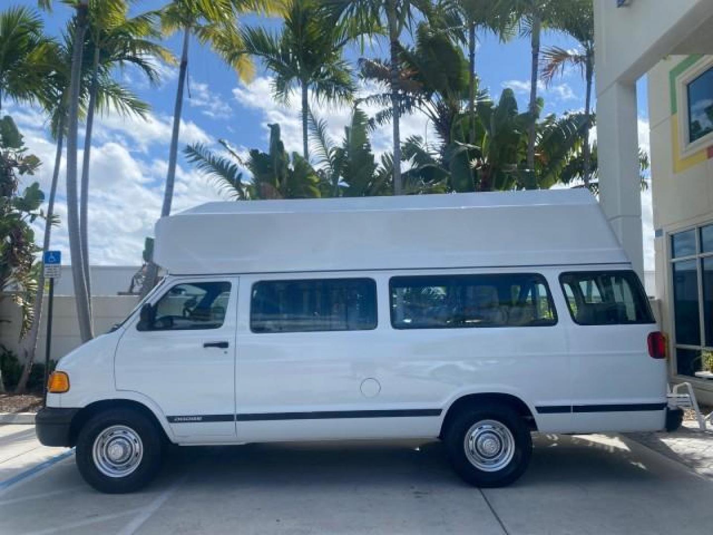 2002 Bright White /Dark Slate Gray Dodge Ram Van LOW MILES 61,263 HIGH TOP CONVERSION (2B7LB31Z42K) with an 5.9L MPI V8 Magnum Engine engine, Automatic transmission, located at 4701 North Dixie Hwy, Pompano Beach, FL, 33064, (954) 422-2889, 26.240938, -80.123474 - OUR WEBPAGE FLORIDACARS1.COM HAS OVER 100 PHOTOS AND FREE CARFAX LINK 2002 DODGE RAM VAN 3500 MAXI EXTENDED HIGH TOP 11 SEATER HANDICAP LIFT VIN: 2B7LB31Z42K117751 2 B 7 L B 3 1 Z 4 2 K 1 1 7 7 5 1 VAN 5.9L V8 F OHV 16V GASOLINE REAR WHEEL DRIVE Features ABS Brakes Air Conditioning AM/FM Stereo Auto - Photo#31