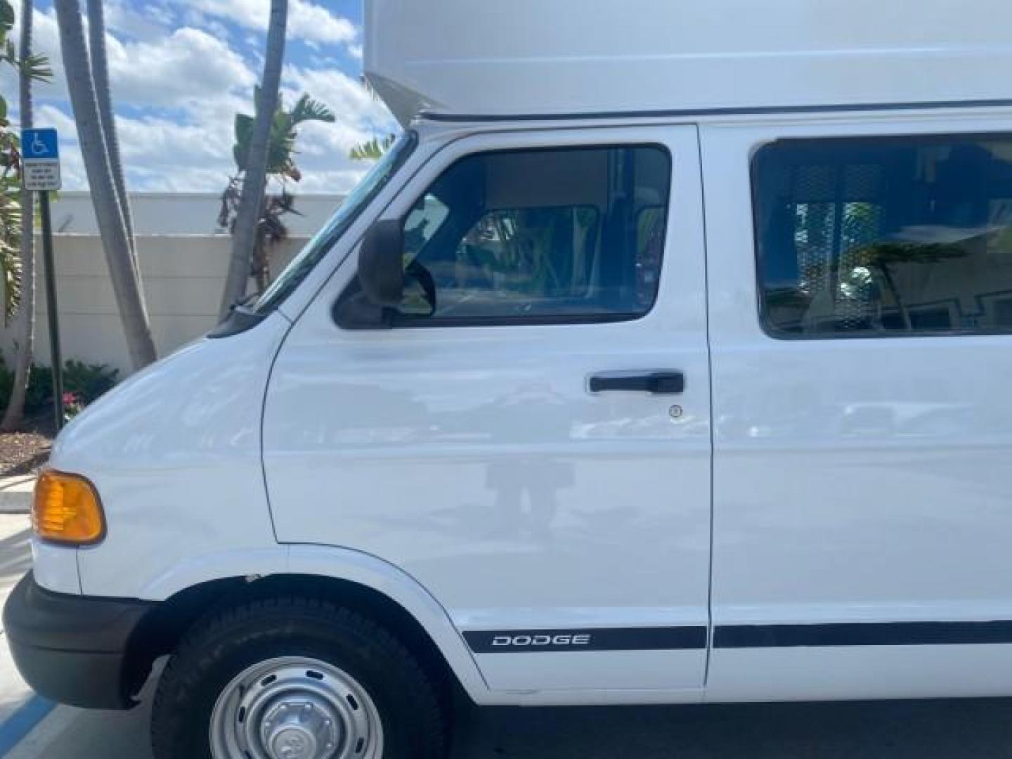 2002 Bright White /Dark Slate Gray Dodge Ram Van LOW MILES 61,263 HIGH TOP CONVERSION (2B7LB31Z42K) with an 5.9L MPI V8 Magnum Engine engine, Automatic transmission, located at 4701 North Dixie Hwy, Pompano Beach, FL, 33064, (954) 422-2889, 26.240938, -80.123474 - OUR WEBPAGE FLORIDACARS1.COM HAS OVER 100 PHOTOS AND FREE CARFAX LINK 2002 DODGE RAM VAN 3500 MAXI EXTENDED HIGH TOP 11 SEATER HANDICAP LIFT VIN: 2B7LB31Z42K117751 2 B 7 L B 3 1 Z 4 2 K 1 1 7 7 5 1 VAN 5.9L V8 F OHV 16V GASOLINE REAR WHEEL DRIVE Features ABS Brakes Air Conditioning AM/FM Stereo Auto - Photo#36