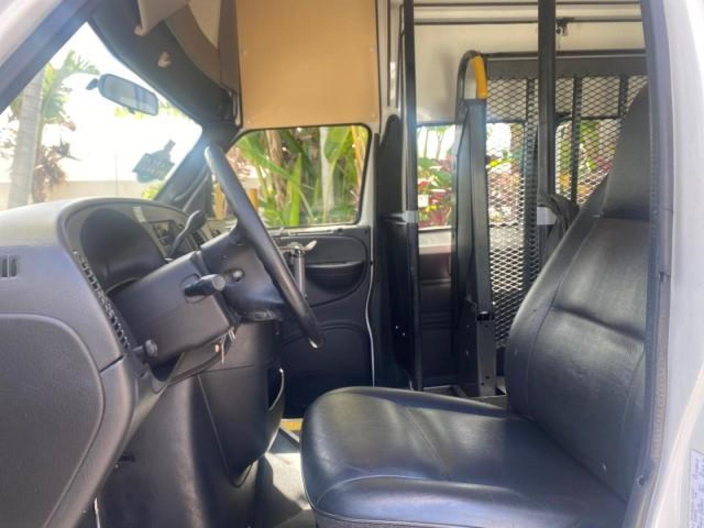 2002 Bright White /Dark Slate Gray Dodge Ram Van LOW MILES 61,263 HIGH TOP CONVERSION (2B7LB31Z42K) with an 5.9L MPI V8 Magnum Engine engine, Automatic transmission, located at 4701 North Dixie Hwy, Pompano Beach, FL, 33064, (954) 422-2889, 26.240938, -80.123474 - OUR WEBPAGE FLORIDACARS1.COM HAS OVER 100 PHOTOS AND FREE CARFAX LINK 2002 DODGE RAM VAN 3500 MAXI EXTENDED HIGH TOP 11 SEATER HANDICAP LIFT VIN: 2B7LB31Z42K117751 2 B 7 L B 3 1 Z 4 2 K 1 1 7 7 5 1 VAN 5.9L V8 F OHV 16V GASOLINE REAR WHEEL DRIVE Features ABS Brakes Air Conditioning AM/FM Stereo Auto - Photo#42