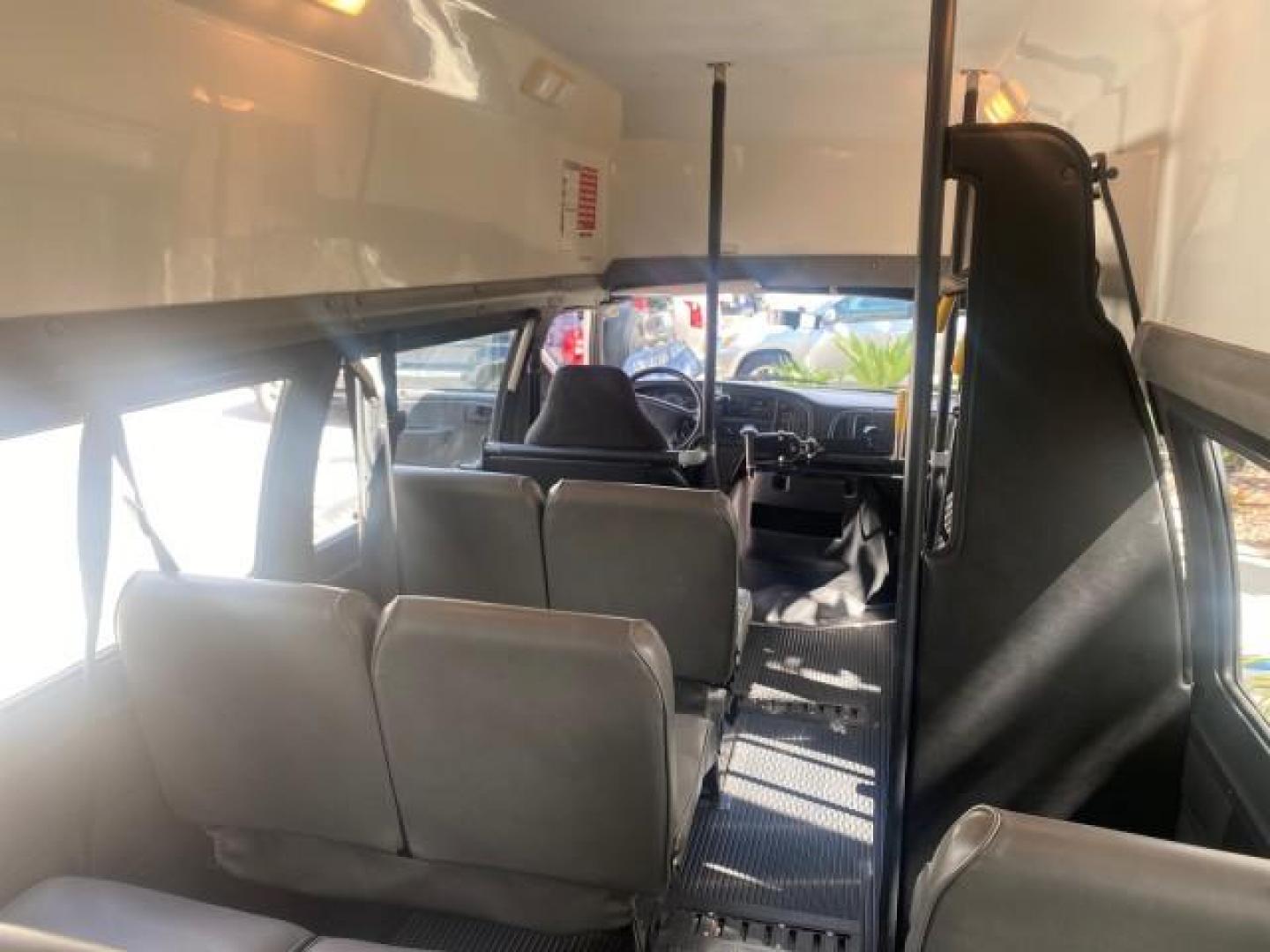 2002 Bright White /Dark Slate Gray Dodge Ram Van LOW MILES 61,263 HIGH TOP CONVERSION (2B7LB31Z42K) with an 5.9L MPI V8 Magnum Engine engine, Automatic transmission, located at 4701 North Dixie Hwy, Pompano Beach, FL, 33064, (954) 422-2889, 26.240938, -80.123474 - OUR WEBPAGE FLORIDACARS1.COM HAS OVER 100 PHOTOS AND FREE CARFAX LINK 2002 DODGE RAM VAN 3500 MAXI EXTENDED HIGH TOP 11 SEATER HANDICAP LIFT VIN: 2B7LB31Z42K117751 2 B 7 L B 3 1 Z 4 2 K 1 1 7 7 5 1 VAN 5.9L V8 F OHV 16V GASOLINE REAR WHEEL DRIVE Features ABS Brakes Air Conditioning AM/FM Stereo Auto - Photo#76
