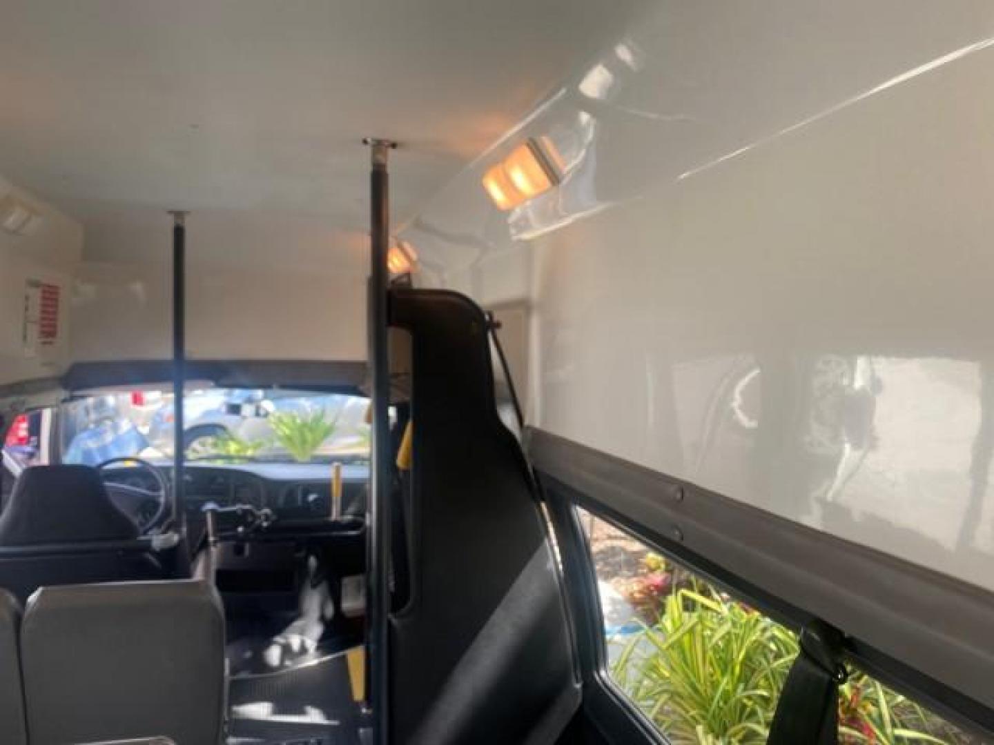 2002 Bright White /Dark Slate Gray Dodge Ram Van LOW MILES 61,263 HIGH TOP CONVERSION (2B7LB31Z42K) with an 5.9L MPI V8 Magnum Engine engine, Automatic transmission, located at 4701 North Dixie Hwy, Pompano Beach, FL, 33064, (954) 422-2889, 26.240938, -80.123474 - OUR WEBPAGE FLORIDACARS1.COM HAS OVER 100 PHOTOS AND FREE CARFAX LINK 2002 DODGE RAM VAN 3500 MAXI EXTENDED HIGH TOP 11 SEATER HANDICAP LIFT VIN: 2B7LB31Z42K117751 2 B 7 L B 3 1 Z 4 2 K 1 1 7 7 5 1 VAN 5.9L V8 F OHV 16V GASOLINE REAR WHEEL DRIVE Features ABS Brakes Air Conditioning AM/FM Stereo Auto - Photo#78