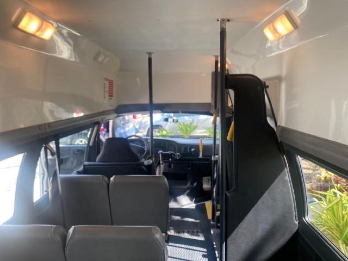 2002 Bright White /Dark Slate Gray Dodge Ram Van LOW MILES 61,263 HIGH TOP CONVERSION (2B7LB31Z42K) with an 5.9L MPI V8 Magnum Engine engine, Automatic transmission, located at 4701 North Dixie Hwy, Pompano Beach, FL, 33064, (954) 422-2889, 26.240938, -80.123474 - OUR WEBPAGE FLORIDACARS1.COM HAS OVER 100 PHOTOS AND FREE CARFAX LINK 2002 DODGE RAM VAN 3500 MAXI EXTENDED HIGH TOP 11 SEATER HANDICAP LIFT VIN: 2B7LB31Z42K117751 2 B 7 L B 3 1 Z 4 2 K 1 1 7 7 5 1 VAN 5.9L V8 F OHV 16V GASOLINE REAR WHEEL DRIVE Features ABS Brakes Air Conditioning AM/FM Stereo Auto - Photo#79