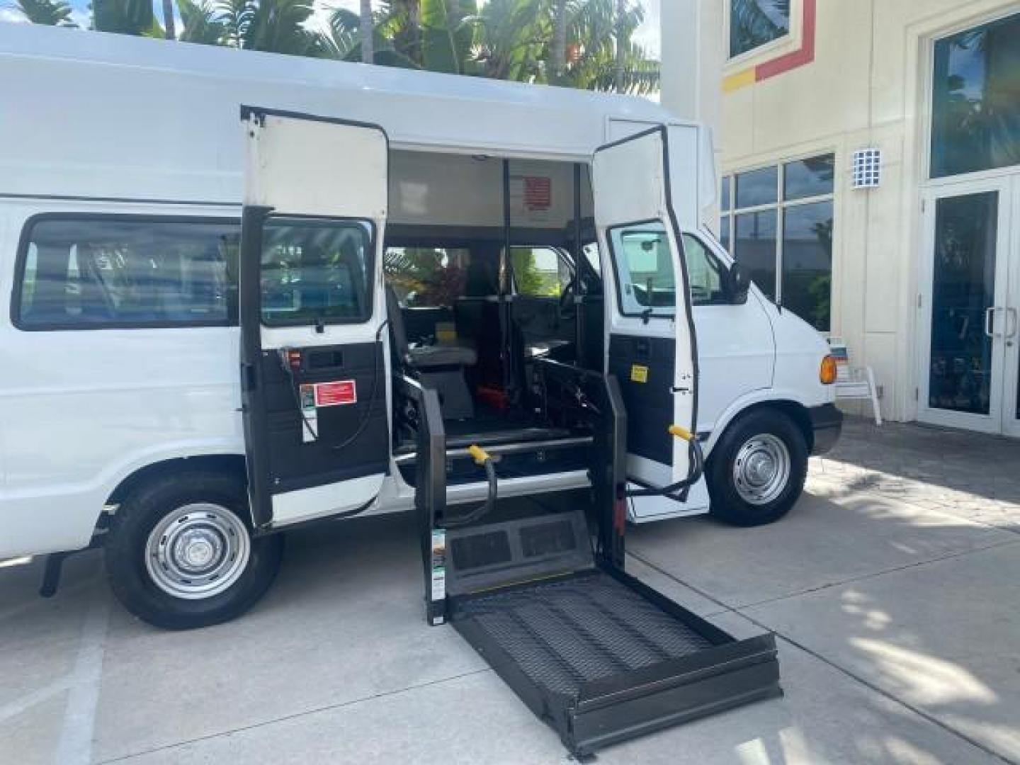 2002 Bright White /Dark Slate Gray Dodge Ram Van LOW MILES 61,263 HIGH TOP CONVERSION (2B7LB31Z42K) with an 5.9L MPI V8 Magnum Engine engine, Automatic transmission, located at 4701 North Dixie Hwy, Pompano Beach, FL, 33064, (954) 422-2889, 26.240938, -80.123474 - OUR WEBPAGE FLORIDACARS1.COM HAS OVER 100 PHOTOS AND FREE CARFAX LINK 2002 DODGE RAM VAN 3500 MAXI EXTENDED HIGH TOP 11 SEATER HANDICAP LIFT VIN: 2B7LB31Z42K117751 2 B 7 L B 3 1 Z 4 2 K 1 1 7 7 5 1 VAN 5.9L V8 F OHV 16V GASOLINE REAR WHEEL DRIVE Features ABS Brakes Air Conditioning AM/FM Stereo Auto - Photo#81