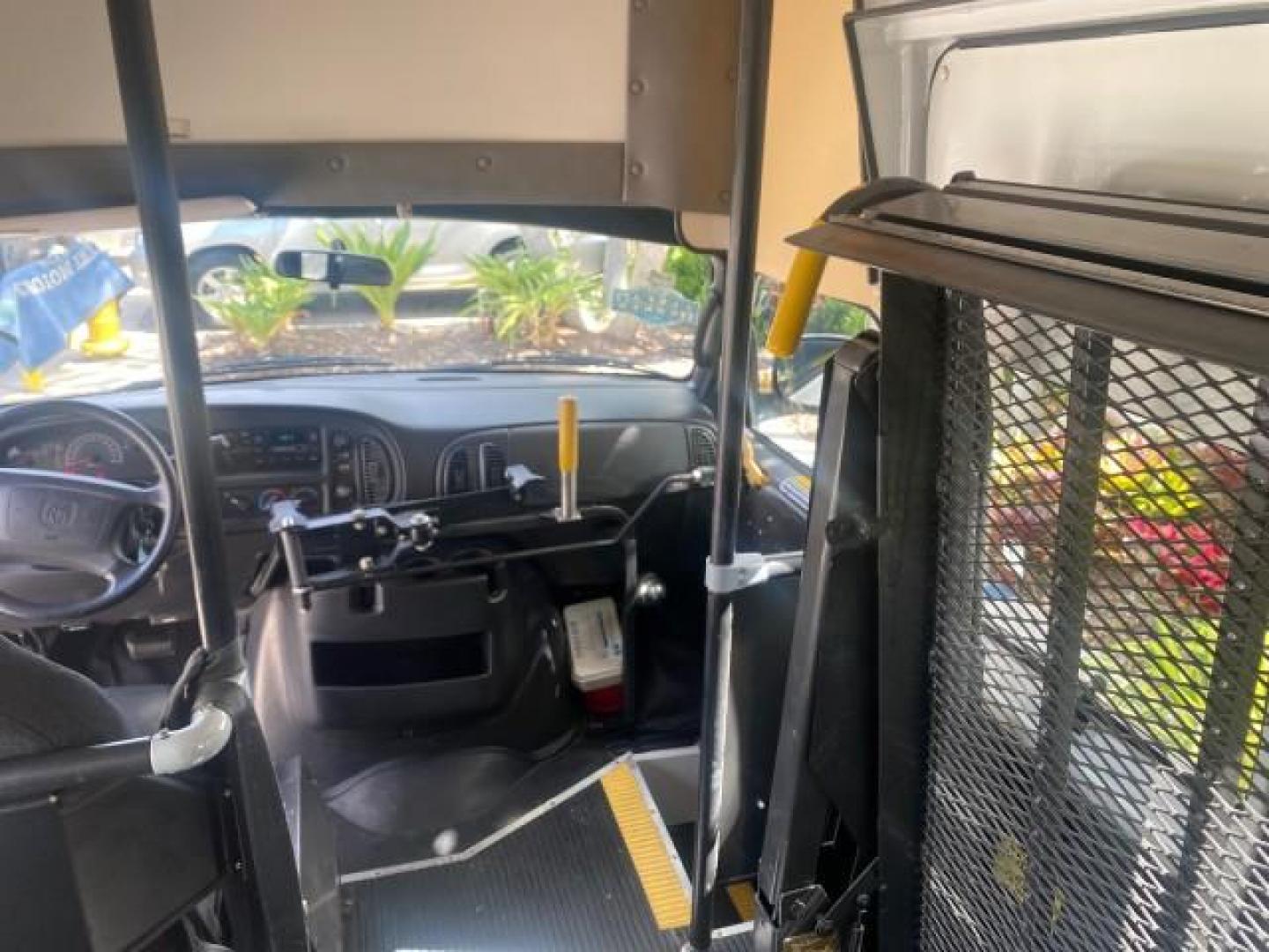 2002 Bright White /Dark Slate Gray Dodge Ram Van LOW MILES 61,263 HIGH TOP CONVERSION (2B7LB31Z42K) with an 5.9L MPI V8 Magnum Engine engine, Automatic transmission, located at 4701 North Dixie Hwy, Pompano Beach, FL, 33064, (954) 422-2889, 26.240938, -80.123474 - OUR WEBPAGE FLORIDACARS1.COM HAS OVER 100 PHOTOS AND FREE CARFAX LINK 2002 DODGE RAM VAN 3500 MAXI EXTENDED HIGH TOP 11 SEATER HANDICAP LIFT VIN: 2B7LB31Z42K117751 2 B 7 L B 3 1 Z 4 2 K 1 1 7 7 5 1 VAN 5.9L V8 F OHV 16V GASOLINE REAR WHEEL DRIVE Features ABS Brakes Air Conditioning AM/FM Stereo Auto - Photo#83