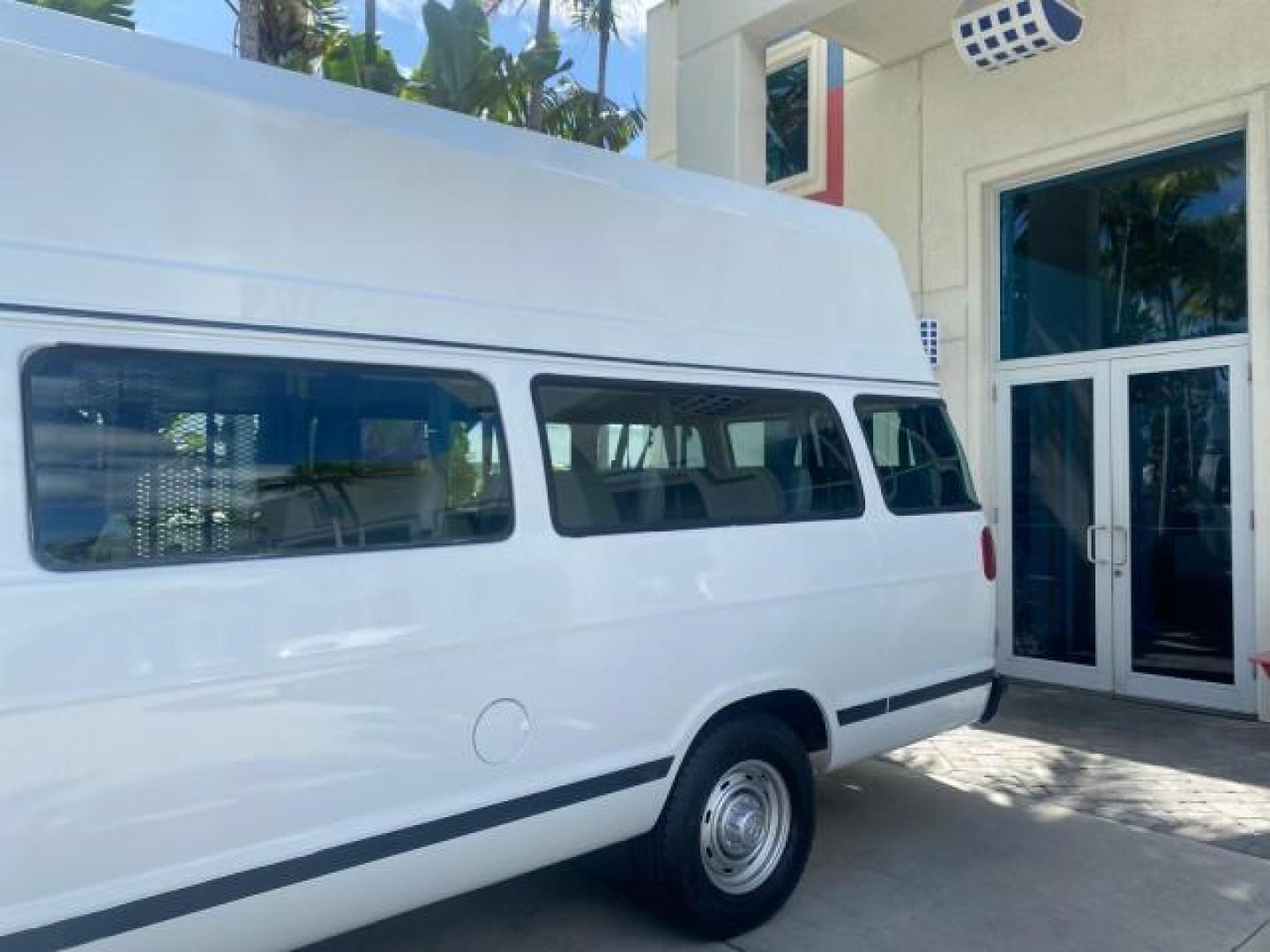 2002 Bright White /Dark Slate Gray Dodge Ram Van LOW MILES 61,263 HIGH TOP CONVERSION (2B7LB31Z42K) with an 5.9L MPI V8 Magnum Engine engine, Automatic transmission, located at 4701 North Dixie Hwy, Pompano Beach, FL, 33064, (954) 422-2889, 26.240938, -80.123474 - OUR WEBPAGE FLORIDACARS1.COM HAS OVER 100 PHOTOS AND FREE CARFAX LINK 2002 DODGE RAM VAN 3500 MAXI EXTENDED HIGH TOP 11 SEATER HANDICAP LIFT VIN: 2B7LB31Z42K117751 2 B 7 L B 3 1 Z 4 2 K 1 1 7 7 5 1 VAN 5.9L V8 F OHV 16V GASOLINE REAR WHEEL DRIVE Features ABS Brakes Air Conditioning AM/FM Stereo Auto - Photo#86