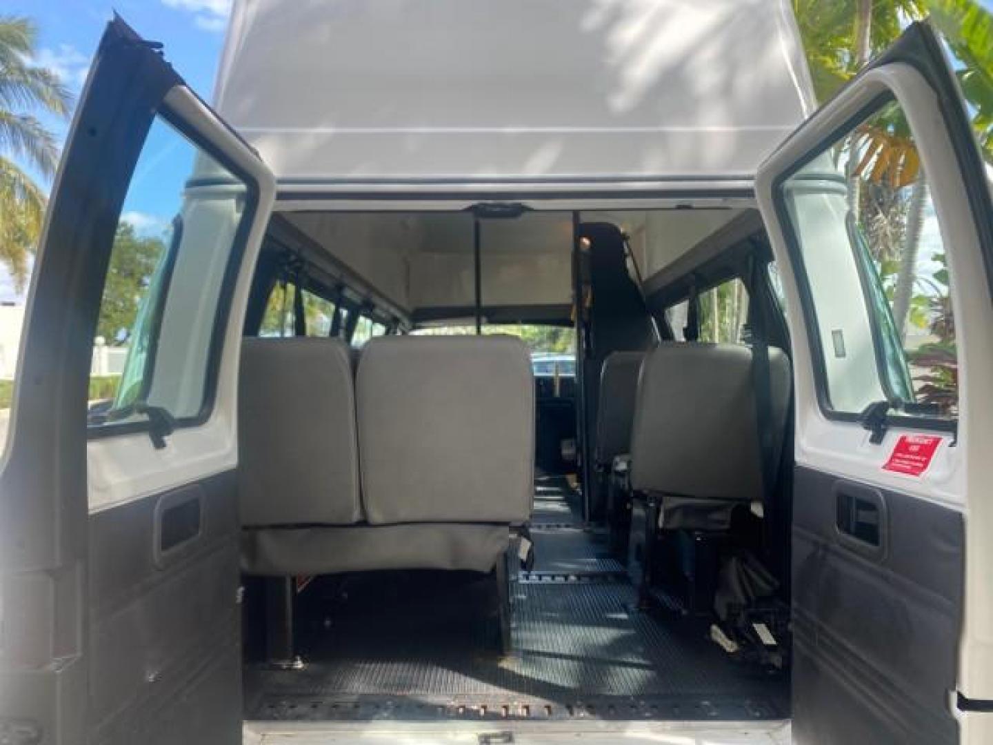 2002 Bright White /Dark Slate Gray Dodge Ram Van LOW MILES 61,263 HIGH TOP CONVERSION (2B7LB31Z42K) with an 5.9L MPI V8 Magnum Engine engine, Automatic transmission, located at 4701 North Dixie Hwy, Pompano Beach, FL, 33064, (954) 422-2889, 26.240938, -80.123474 - OUR WEBPAGE FLORIDACARS1.COM HAS OVER 100 PHOTOS AND FREE CARFAX LINK 2002 DODGE RAM VAN 3500 MAXI EXTENDED HIGH TOP 11 SEATER HANDICAP LIFT VIN: 2B7LB31Z42K117751 2 B 7 L B 3 1 Z 4 2 K 1 1 7 7 5 1 VAN 5.9L V8 F OHV 16V GASOLINE REAR WHEEL DRIVE Features ABS Brakes Air Conditioning AM/FM Stereo Auto - Photo#95