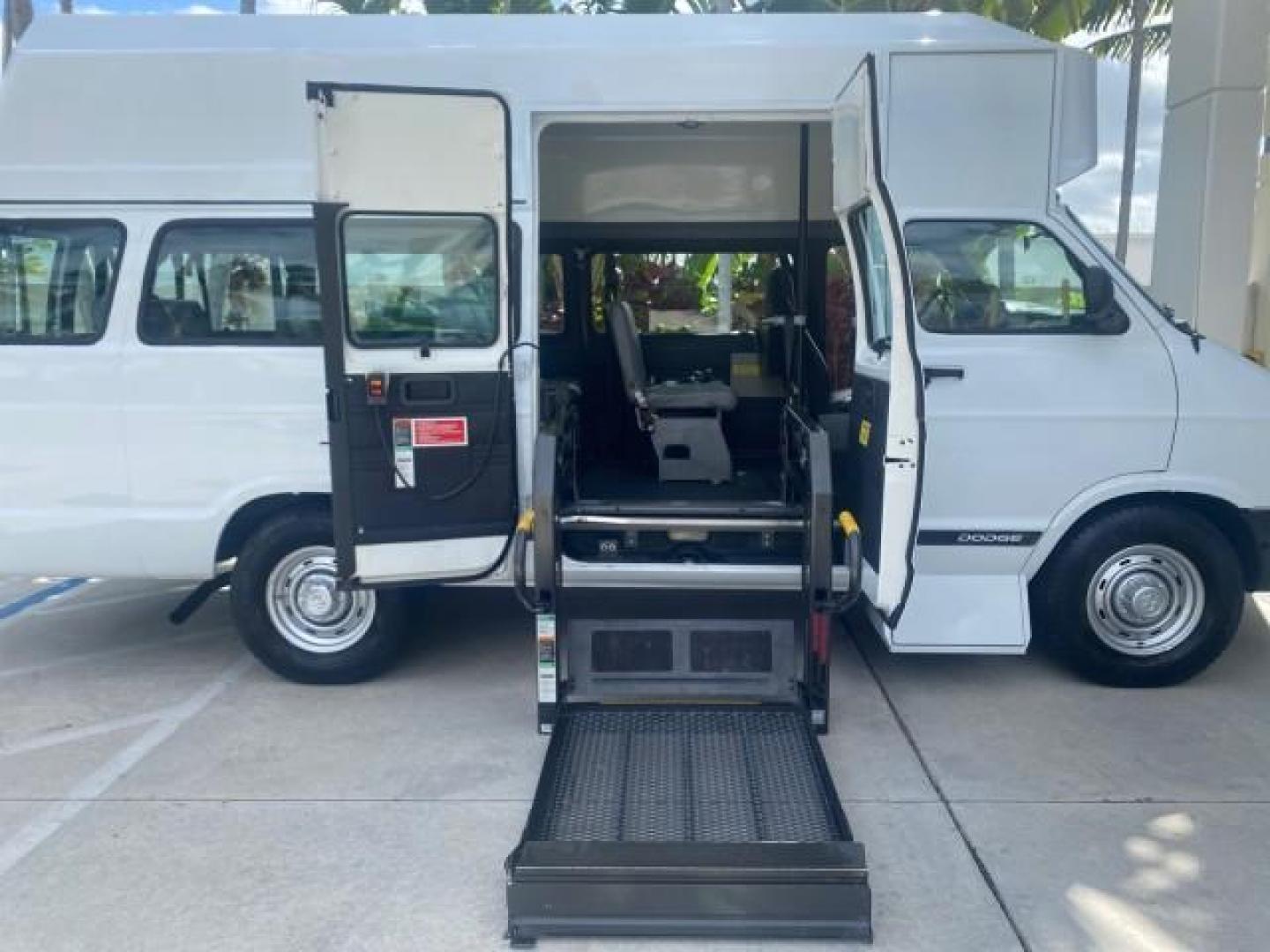 2002 Bright White /Dark Slate Gray Dodge Ram Van LOW MILES 61,263 HIGH TOP CONVERSION (2B7LB31Z42K) with an 5.9L MPI V8 Magnum Engine engine, Automatic transmission, located at 4701 North Dixie Hwy, Pompano Beach, FL, 33064, (954) 422-2889, 26.240938, -80.123474 - OUR WEBPAGE FLORIDACARS1.COM HAS OVER 100 PHOTOS AND FREE CARFAX LINK 2002 DODGE RAM VAN 3500 MAXI EXTENDED HIGH TOP 11 SEATER HANDICAP LIFT VIN: 2B7LB31Z42K117751 2 B 7 L B 3 1 Z 4 2 K 1 1 7 7 5 1 VAN 5.9L V8 F OHV 16V GASOLINE REAR WHEEL DRIVE Features ABS Brakes Air Conditioning AM/FM Stereo Auto - Photo#14