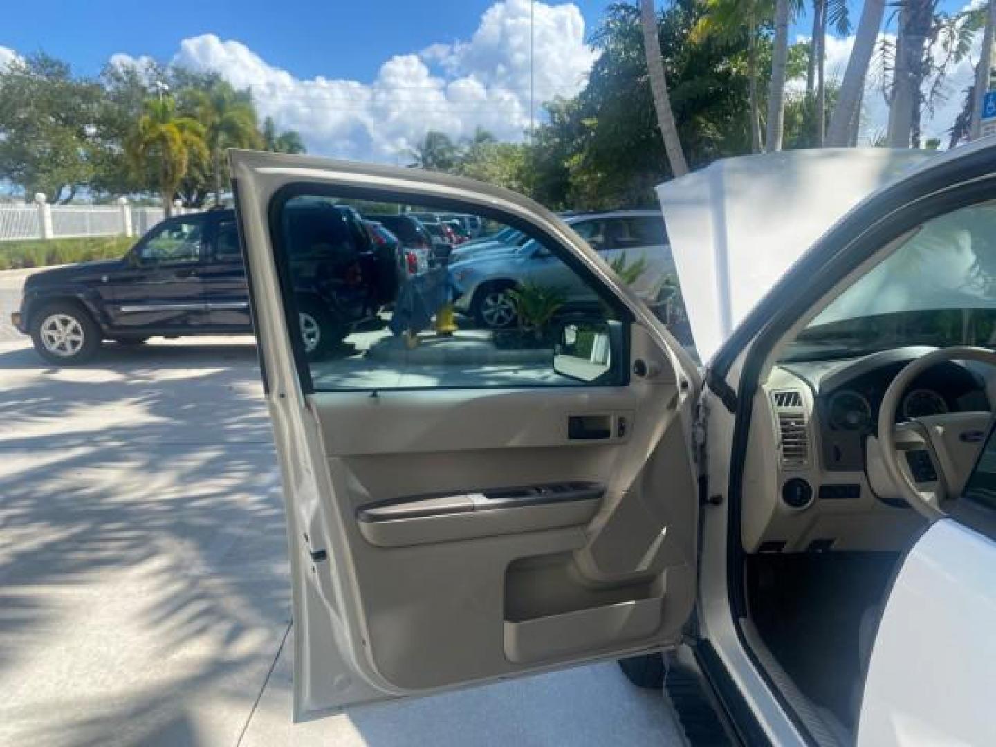 2011 Oxford White /Stone Ford Escape XLS LOW MILES 28,150 (1FMCU0C76BK) with an 2.5L I4 Duratec Engine engine, Automatic transmission, located at 4701 North Dixie Hwy, Pompano Beach, FL, 33064, (954) 422-2889, 26.240938, -80.123474 - OUR WEBPAGE FLORIDACARS1.COM HAS OVER 100 PHOTOS AND FREE CARFAX LINK 2011 FORD ESCAPE XLS VIN: 1FMCU0C76BKB57805 1 F M C U 0 C 7 6 B K B 5 7 8 0 5 4 DOOR WAGON/SPORT UTILITY 2.5L I4 F DOHC 16V GASOLINE FRONT WHEEL DRIVE Features ABS Brakes Air Conditioning Alloy Wheels AM/FM Stereo Automatic Transm - Photo#9