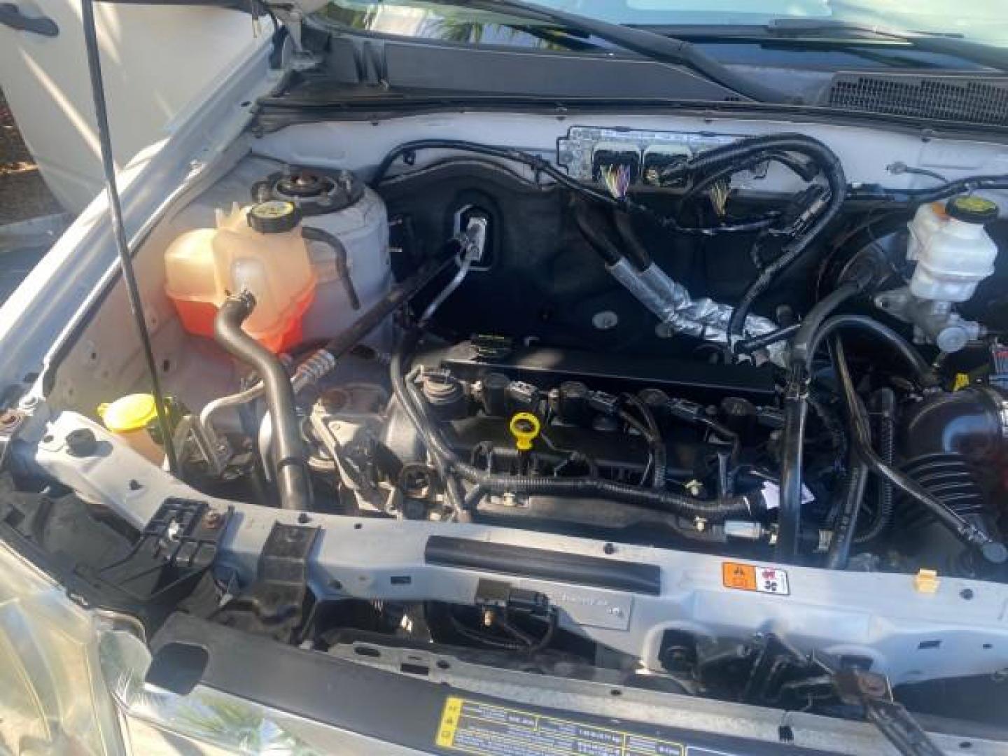 2011 Oxford White /Stone Ford Escape XLS LOW MILES 28,150 (1FMCU0C76BK) with an 2.5L I4 Duratec Engine engine, Automatic transmission, located at 4701 North Dixie Hwy, Pompano Beach, FL, 33064, (954) 422-2889, 26.240938, -80.123474 - OUR WEBPAGE FLORIDACARS1.COM HAS OVER 100 PHOTOS AND FREE CARFAX LINK 2011 FORD ESCAPE XLS VIN: 1FMCU0C76BKB57805 1 F M C U 0 C 7 6 B K B 5 7 8 0 5 4 DOOR WAGON/SPORT UTILITY 2.5L I4 F DOHC 16V GASOLINE FRONT WHEEL DRIVE Features ABS Brakes Air Conditioning Alloy Wheels AM/FM Stereo Automatic Transm - Photo#24