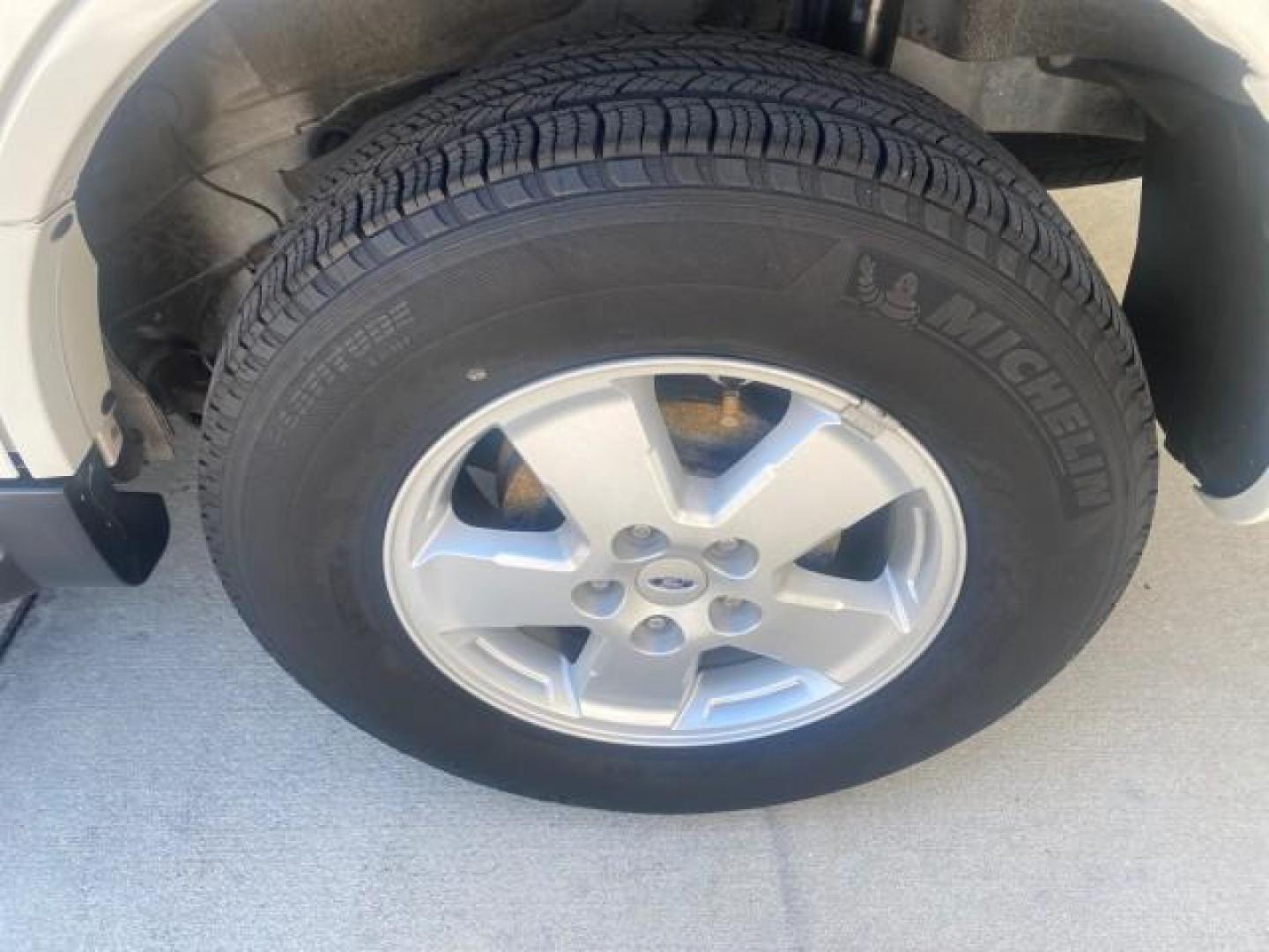 2011 Oxford White /Stone Ford Escape XLS LOW MILES 28,150 (1FMCU0C76BK) with an 2.5L I4 Duratec Engine engine, Automatic transmission, located at 4701 North Dixie Hwy, Pompano Beach, FL, 33064, (954) 422-2889, 26.240938, -80.123474 - OUR WEBPAGE FLORIDACARS1.COM HAS OVER 100 PHOTOS AND FREE CARFAX LINK 2011 FORD ESCAPE XLS VIN: 1FMCU0C76BKB57805 1 F M C U 0 C 7 6 B K B 5 7 8 0 5 4 DOOR WAGON/SPORT UTILITY 2.5L I4 F DOHC 16V GASOLINE FRONT WHEEL DRIVE Features ABS Brakes Air Conditioning Alloy Wheels AM/FM Stereo Automatic Transm - Photo#83