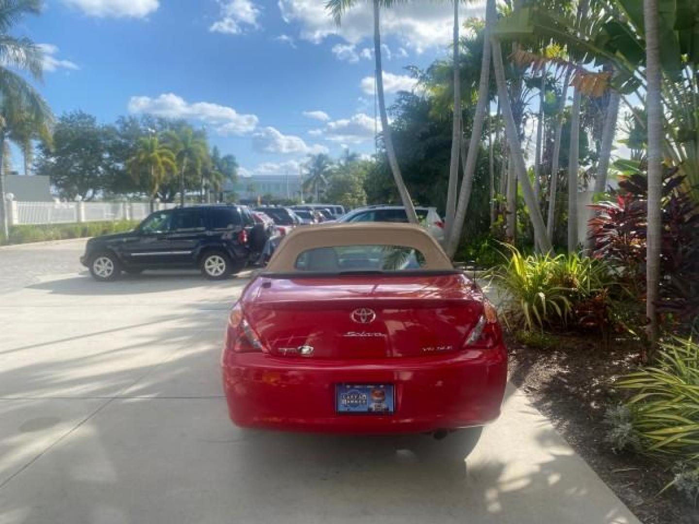 2005 Absolutely Red /Ivory Toyota Camry Solara SLE LOW MILES 63,889 (4T1FA38P85U) with an 3.3L DOHC SEFI VVT-i 24-Valve V6 Engine engine, Automatic transmission, located at 4701 North Dixie Hwy, Pompano Beach, FL, 33064, (954) 422-2889, 26.240938, -80.123474 - OUR WEBPAGE FLORIDACARS1.COM HAS OVER 100 PHOTOS AND FREE CARFAX LINK 2005 TOYOTA CAMRY SOLARA SLE V6 LOADED TOP OF THE LINE VIN: 4T1FA38P85U063157 4 T 1 F A 3 8 P 8 5 U 0 6 3 1 5 7 CONVERTIBLE 3.3L V6 F DOHC 24V GASOLINE FRONT WHEEL DRIVE Features ABS Brakes Air Conditioning Alloy Wheels AM/FM Ster - Photo#6