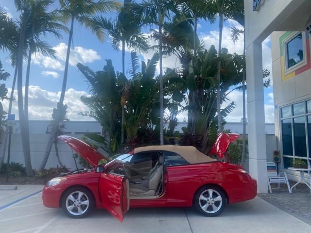 2005 Absolutely Red /Ivory Toyota Camry Solara SLE LOW MILES 63,889 (4T1FA38P85U) with an 3.3L DOHC SEFI VVT-i 24-Valve V6 Engine engine, Automatic transmission, located at 4701 North Dixie Hwy, Pompano Beach, FL, 33064, (954) 422-2889, 26.240938, -80.123474 - OUR WEBPAGE FLORIDACARS1.COM HAS OVER 100 PHOTOS AND FREE CARFAX LINK 2005 TOYOTA CAMRY SOLARA SLE V6 LOADED TOP OF THE LINE VIN: 4T1FA38P85U063157 4 T 1 F A 3 8 P 8 5 U 0 6 3 1 5 7 CONVERTIBLE 3.3L V6 F DOHC 24V GASOLINE FRONT WHEEL DRIVE Features ABS Brakes Air Conditioning Alloy Wheels AM/FM Ster - Photo#8