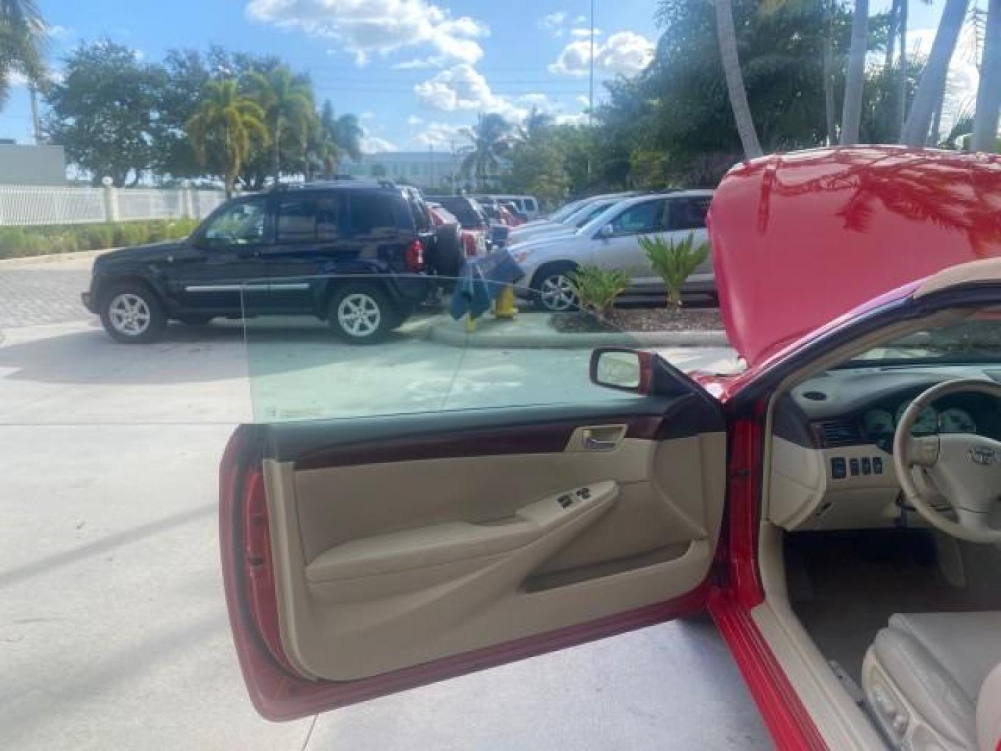 2005 Absolutely Red /Ivory Toyota Camry Solara SLE LOW MILES 63,889 (4T1FA38P85U) with an 3.3L DOHC SEFI VVT-i 24-Valve V6 Engine engine, Automatic transmission, located at 4701 North Dixie Hwy, Pompano Beach, FL, 33064, (954) 422-2889, 26.240938, -80.123474 - OUR WEBPAGE FLORIDACARS1.COM HAS OVER 100 PHOTOS AND FREE CARFAX LINK 2005 TOYOTA CAMRY SOLARA SLE V6 LOADED TOP OF THE LINE VIN: 4T1FA38P85U063157 4 T 1 F A 3 8 P 8 5 U 0 6 3 1 5 7 CONVERTIBLE 3.3L V6 F DOHC 24V GASOLINE FRONT WHEEL DRIVE Features ABS Brakes Air Conditioning Alloy Wheels AM/FM Ster - Photo#9