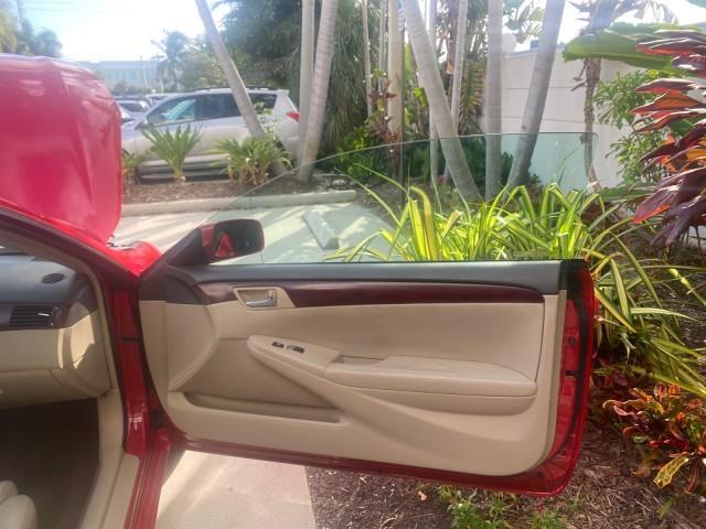 2005 Absolutely Red /Ivory Toyota Camry Solara SLE LOW MILES 63,889 (4T1FA38P85U) with an 3.3L DOHC SEFI VVT-i 24-Valve V6 Engine engine, Automatic transmission, located at 4701 North Dixie Hwy, Pompano Beach, FL, 33064, (954) 422-2889, 26.240938, -80.123474 - OUR WEBPAGE FLORIDACARS1.COM HAS OVER 100 PHOTOS AND FREE CARFAX LINK 2005 TOYOTA CAMRY SOLARA SLE V6 LOADED TOP OF THE LINE VIN: 4T1FA38P85U063157 4 T 1 F A 3 8 P 8 5 U 0 6 3 1 5 7 CONVERTIBLE 3.3L V6 F DOHC 24V GASOLINE FRONT WHEEL DRIVE Features ABS Brakes Air Conditioning Alloy Wheels AM/FM Ster - Photo#11