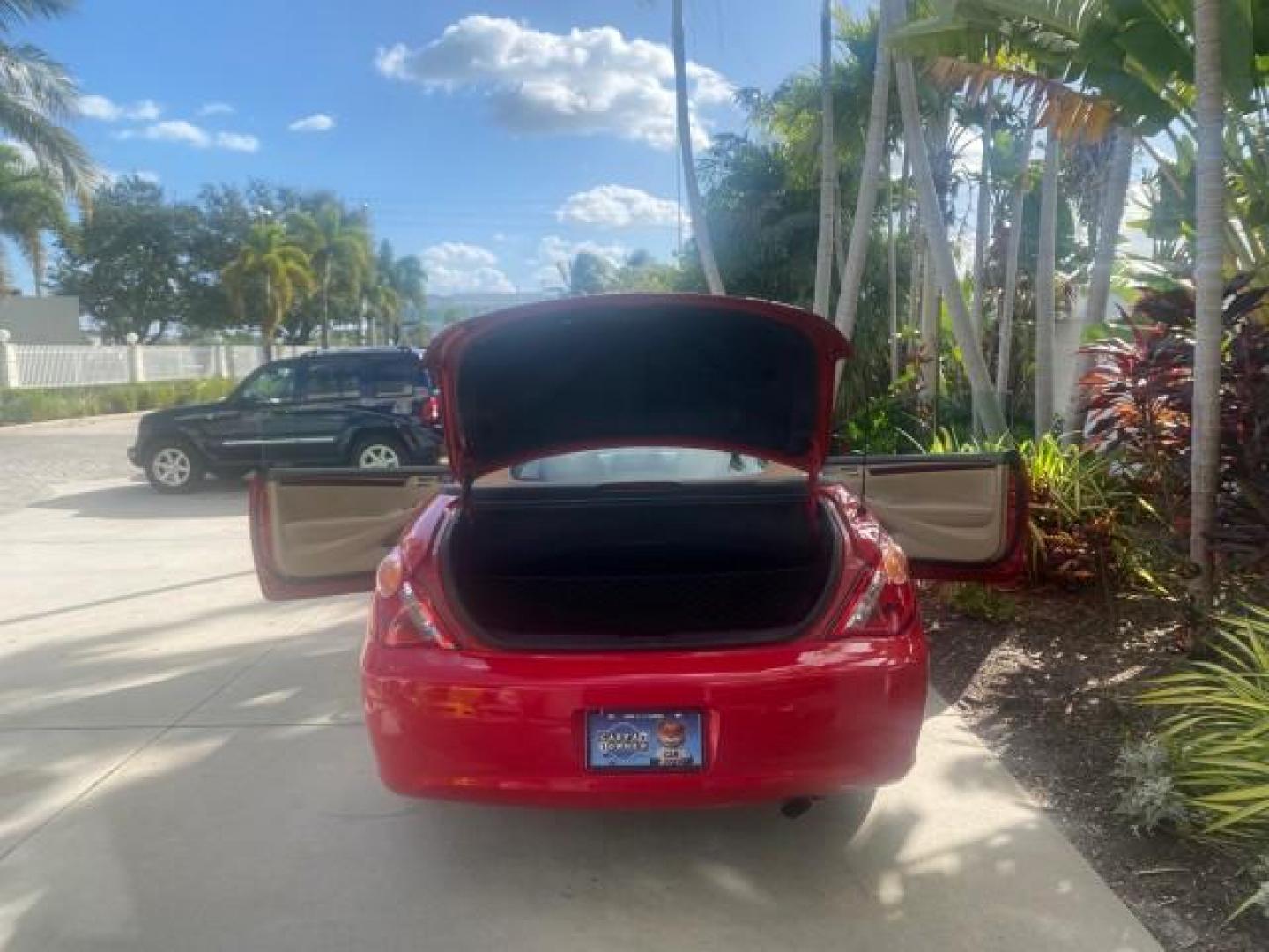 2005 Absolutely Red /Ivory Toyota Camry Solara SLE LOW MILES 63,889 (4T1FA38P85U) with an 3.3L DOHC SEFI VVT-i 24-Valve V6 Engine engine, Automatic transmission, located at 4701 North Dixie Hwy, Pompano Beach, FL, 33064, (954) 422-2889, 26.240938, -80.123474 - OUR WEBPAGE FLORIDACARS1.COM HAS OVER 100 PHOTOS AND FREE CARFAX LINK 2005 TOYOTA CAMRY SOLARA SLE V6 LOADED TOP OF THE LINE VIN: 4T1FA38P85U063157 4 T 1 F A 3 8 P 8 5 U 0 6 3 1 5 7 CONVERTIBLE 3.3L V6 F DOHC 24V GASOLINE FRONT WHEEL DRIVE Features ABS Brakes Air Conditioning Alloy Wheels AM/FM Ster - Photo#15