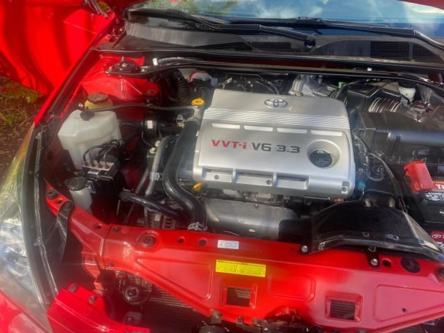 2005 Absolutely Red /Ivory Toyota Camry Solara SLE LOW MILES 63,889 (4T1FA38P85U) with an 3.3L DOHC SEFI VVT-i 24-Valve V6 Engine engine, Automatic transmission, located at 4701 North Dixie Hwy, Pompano Beach, FL, 33064, (954) 422-2889, 26.240938, -80.123474 - OUR WEBPAGE FLORIDACARS1.COM HAS OVER 100 PHOTOS AND FREE CARFAX LINK 2005 TOYOTA CAMRY SOLARA SLE V6 LOADED TOP OF THE LINE VIN: 4T1FA38P85U063157 4 T 1 F A 3 8 P 8 5 U 0 6 3 1 5 7 CONVERTIBLE 3.3L V6 F DOHC 24V GASOLINE FRONT WHEEL DRIVE Features ABS Brakes Air Conditioning Alloy Wheels AM/FM Ster - Photo#25