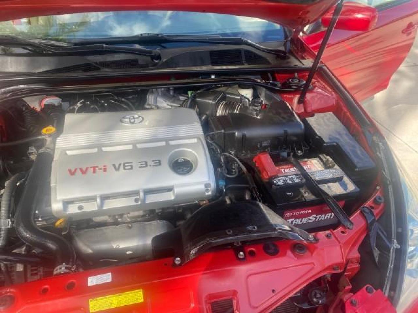 2005 Absolutely Red /Ivory Toyota Camry Solara SLE LOW MILES 63,889 (4T1FA38P85U) with an 3.3L DOHC SEFI VVT-i 24-Valve V6 Engine engine, Automatic transmission, located at 4701 North Dixie Hwy, Pompano Beach, FL, 33064, (954) 422-2889, 26.240938, -80.123474 - OUR WEBPAGE FLORIDACARS1.COM HAS OVER 100 PHOTOS AND FREE CARFAX LINK 2005 TOYOTA CAMRY SOLARA SLE V6 LOADED TOP OF THE LINE VIN: 4T1FA38P85U063157 4 T 1 F A 3 8 P 8 5 U 0 6 3 1 5 7 CONVERTIBLE 3.3L V6 F DOHC 24V GASOLINE FRONT WHEEL DRIVE Features ABS Brakes Air Conditioning Alloy Wheels AM/FM Ster - Photo#26