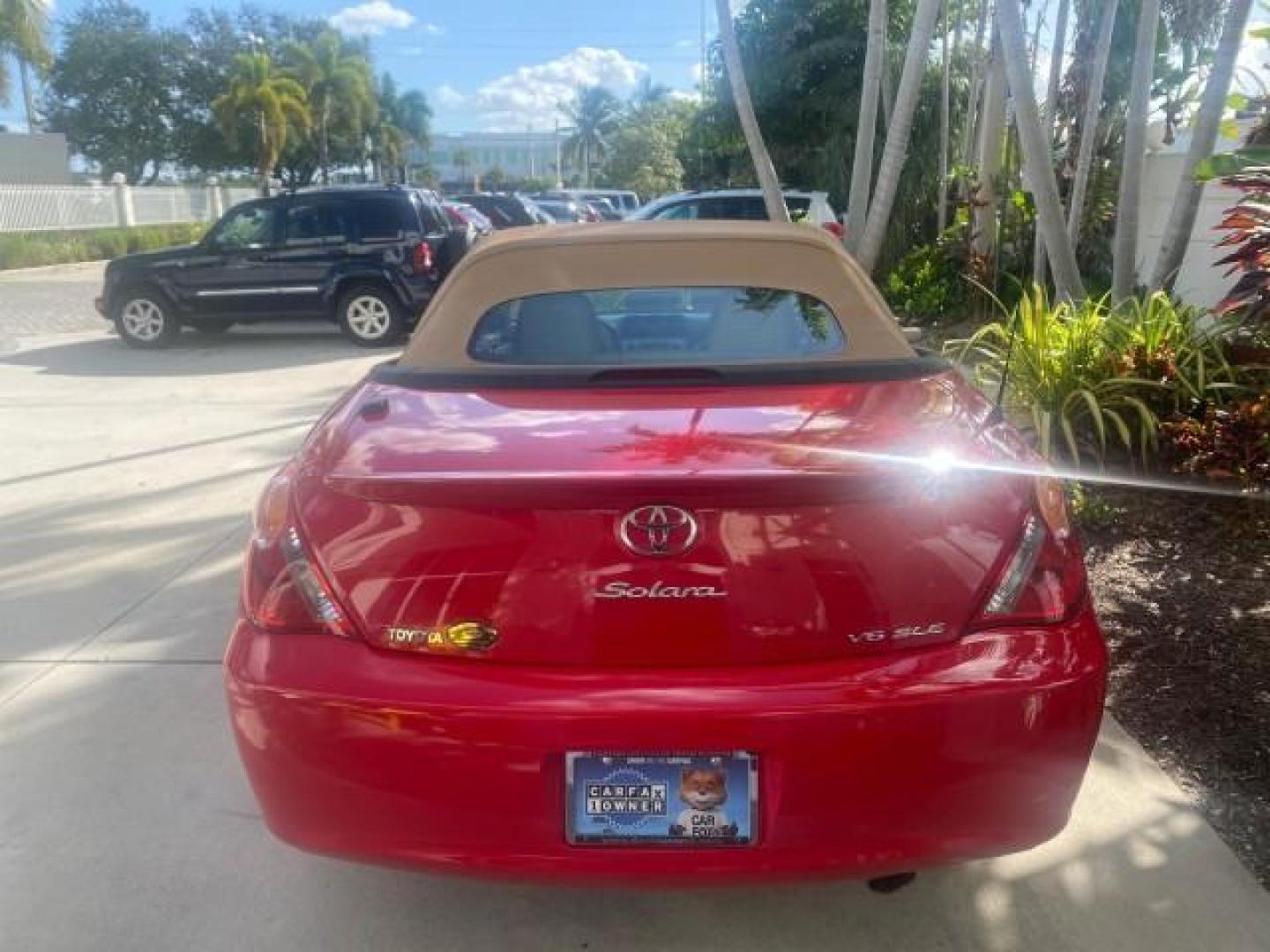2005 Absolutely Red /Ivory Toyota Camry Solara SLE LOW MILES 63,889 (4T1FA38P85U) with an 3.3L DOHC SEFI VVT-i 24-Valve V6 Engine engine, Automatic transmission, located at 4701 North Dixie Hwy, Pompano Beach, FL, 33064, (954) 422-2889, 26.240938, -80.123474 - OUR WEBPAGE FLORIDACARS1.COM HAS OVER 100 PHOTOS AND FREE CARFAX LINK 2005 TOYOTA CAMRY SOLARA SLE V6 LOADED TOP OF THE LINE VIN: 4T1FA38P85U063157 4 T 1 F A 3 8 P 8 5 U 0 6 3 1 5 7 CONVERTIBLE 3.3L V6 F DOHC 24V GASOLINE FRONT WHEEL DRIVE Features ABS Brakes Air Conditioning Alloy Wheels AM/FM Ster - Photo#36
