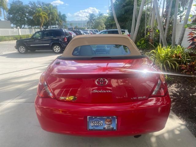 2005 Absolutely Red /Ivory Toyota Camry Solara SLE LOW MILES 63,889 (4T1FA38P85U) with an 3.3L DOHC SEFI VVT-i 24-Valve V6 Engine engine, Automatic transmission, located at 4701 North Dixie Hwy, Pompano Beach, FL, 33064, (954) 422-2889, 26.240938, -80.123474 - OUR WEBPAGE FLORIDACARS1.COM HAS OVER 100 PHOTOS AND FREE CARFAX LINK 2005 TOYOTA CAMRY SOLARA SLE V6 LOADED TOP OF THE LINE VIN: 4T1FA38P85U063157 4 T 1 F A 3 8 P 8 5 U 0 6 3 1 5 7 CONVERTIBLE 3.3L V6 F DOHC 24V GASOLINE FRONT WHEEL DRIVE Features ABS Brakes Air Conditioning Alloy Wheels AM/FM Ster - Photo#36