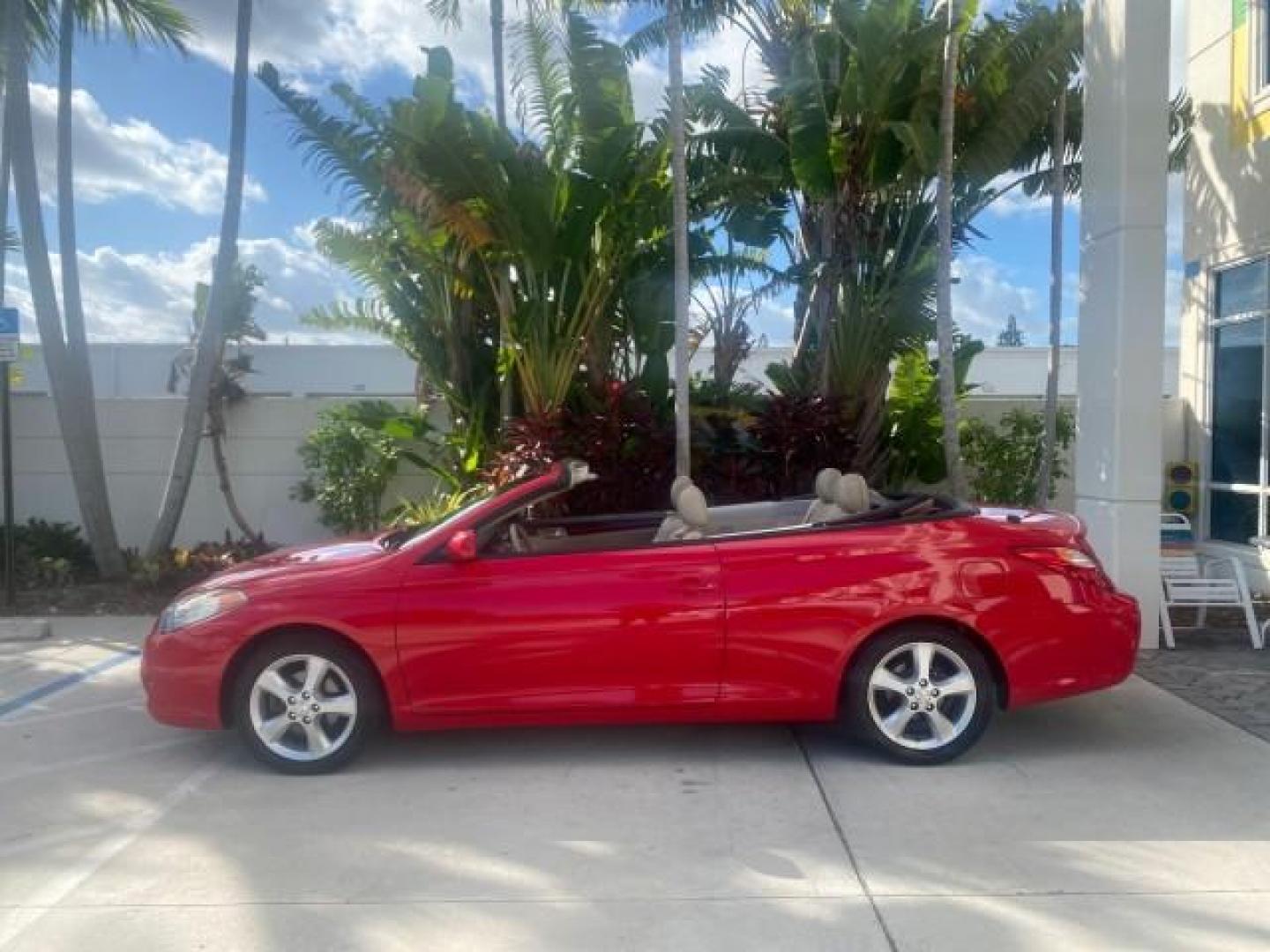 2005 Absolutely Red /Ivory Toyota Camry Solara SLE LOW MILES 63,889 (4T1FA38P85U) with an 3.3L DOHC SEFI VVT-i 24-Valve V6 Engine engine, Automatic transmission, located at 4701 North Dixie Hwy, Pompano Beach, FL, 33064, (954) 422-2889, 26.240938, -80.123474 - OUR WEBPAGE FLORIDACARS1.COM HAS OVER 100 PHOTOS AND FREE CARFAX LINK 2005 TOYOTA CAMRY SOLARA SLE V6 LOADED TOP OF THE LINE VIN: 4T1FA38P85U063157 4 T 1 F A 3 8 P 8 5 U 0 6 3 1 5 7 CONVERTIBLE 3.3L V6 F DOHC 24V GASOLINE FRONT WHEEL DRIVE Features ABS Brakes Air Conditioning Alloy Wheels AM/FM Ster - Photo#41
