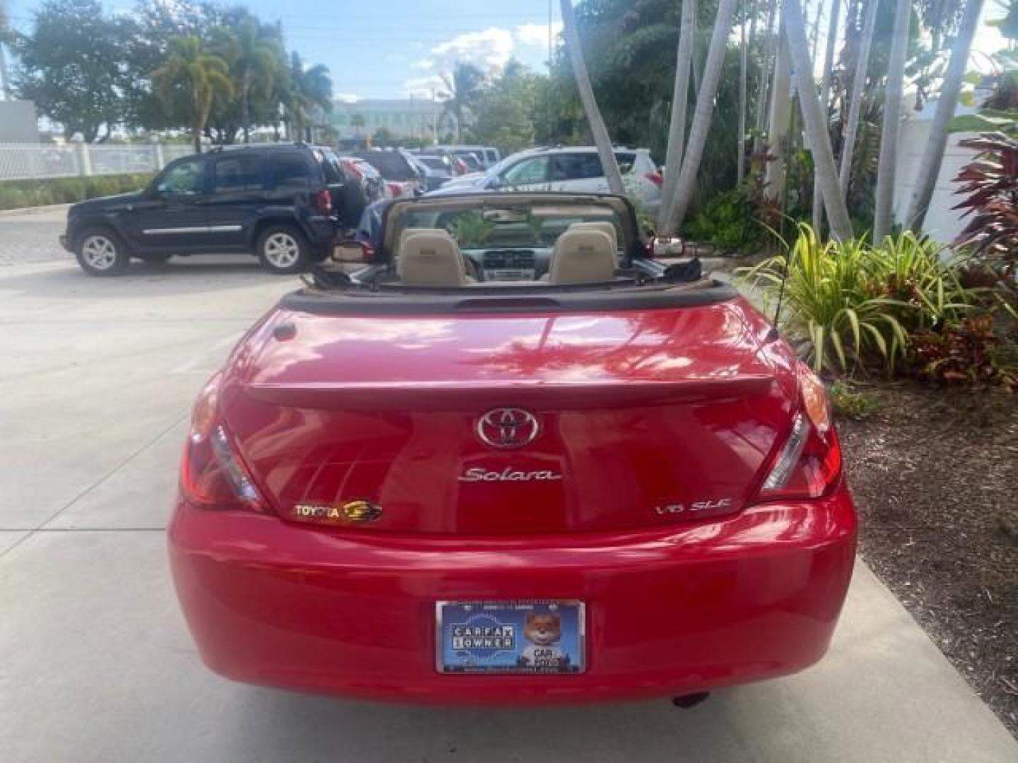 2005 Absolutely Red /Ivory Toyota Camry Solara SLE LOW MILES 63,889 (4T1FA38P85U) with an 3.3L DOHC SEFI VVT-i 24-Valve V6 Engine engine, Automatic transmission, located at 4701 North Dixie Hwy, Pompano Beach, FL, 33064, (954) 422-2889, 26.240938, -80.123474 - OUR WEBPAGE FLORIDACARS1.COM HAS OVER 100 PHOTOS AND FREE CARFAX LINK 2005 TOYOTA CAMRY SOLARA SLE V6 LOADED TOP OF THE LINE VIN: 4T1FA38P85U063157 4 T 1 F A 3 8 P 8 5 U 0 6 3 1 5 7 CONVERTIBLE 3.3L V6 F DOHC 24V GASOLINE FRONT WHEEL DRIVE Features ABS Brakes Air Conditioning Alloy Wheels AM/FM Ster - Photo#46