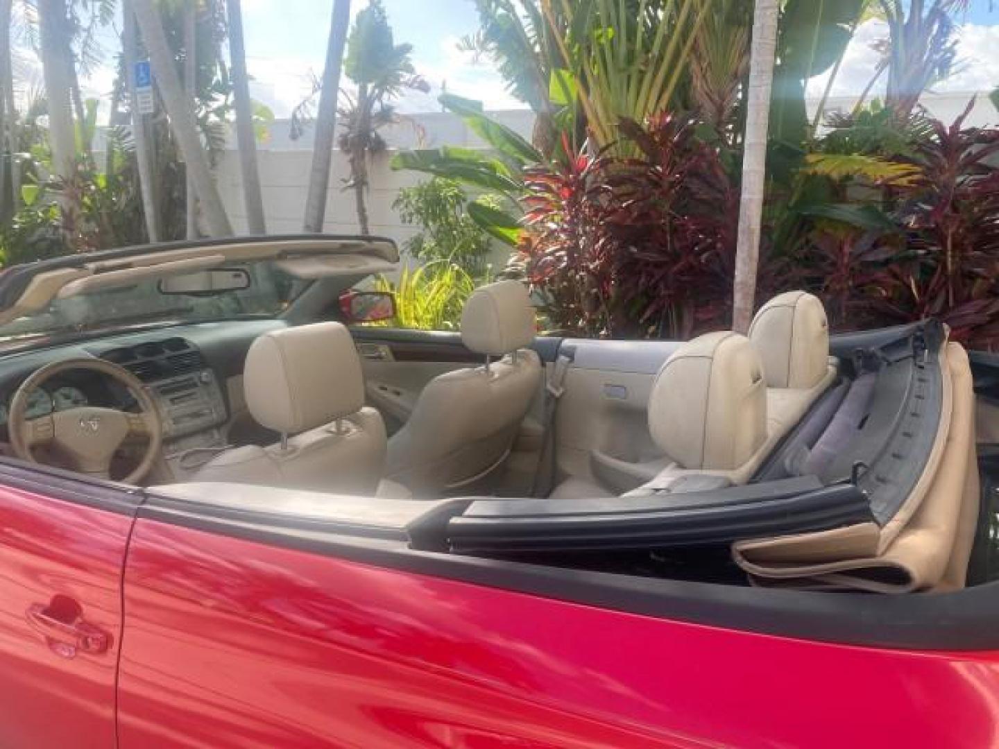 2005 Absolutely Red /Ivory Toyota Camry Solara SLE LOW MILES 63,889 (4T1FA38P85U) with an 3.3L DOHC SEFI VVT-i 24-Valve V6 Engine engine, Automatic transmission, located at 4701 North Dixie Hwy, Pompano Beach, FL, 33064, (954) 422-2889, 26.240938, -80.123474 - OUR WEBPAGE FLORIDACARS1.COM HAS OVER 100 PHOTOS AND FREE CARFAX LINK 2005 TOYOTA CAMRY SOLARA SLE V6 LOADED TOP OF THE LINE VIN: 4T1FA38P85U063157 4 T 1 F A 3 8 P 8 5 U 0 6 3 1 5 7 CONVERTIBLE 3.3L V6 F DOHC 24V GASOLINE FRONT WHEEL DRIVE Features ABS Brakes Air Conditioning Alloy Wheels AM/FM Ster - Photo#48