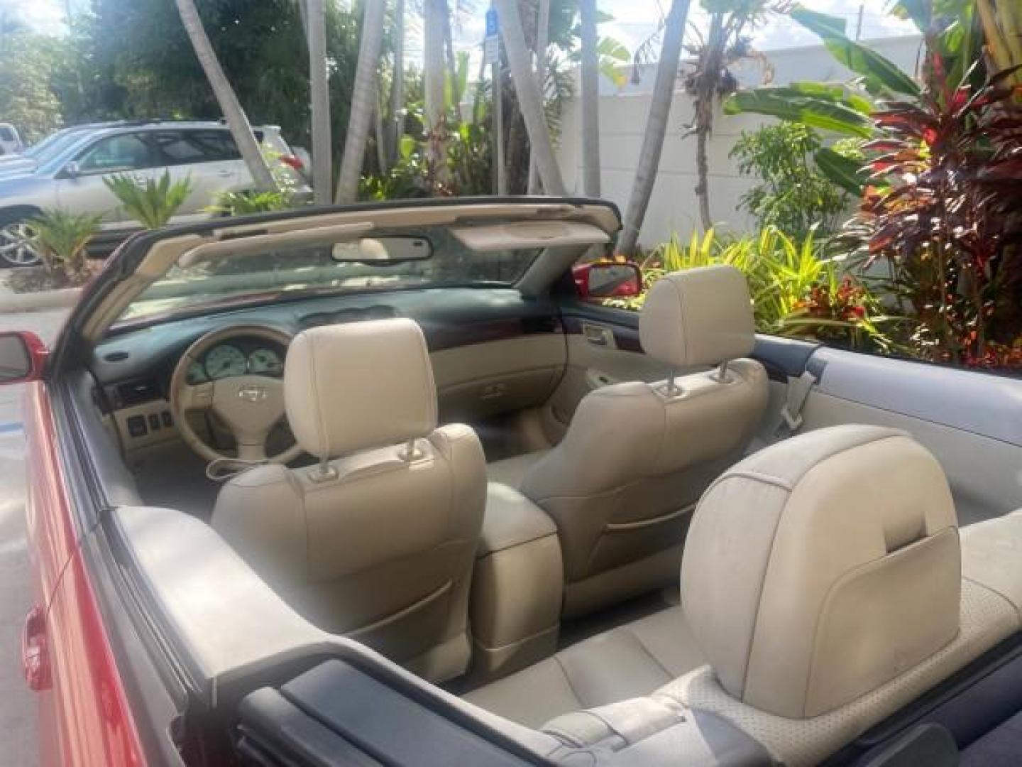 2005 Absolutely Red /Ivory Toyota Camry Solara SLE LOW MILES 63,889 (4T1FA38P85U) with an 3.3L DOHC SEFI VVT-i 24-Valve V6 Engine engine, Automatic transmission, located at 4701 North Dixie Hwy, Pompano Beach, FL, 33064, (954) 422-2889, 26.240938, -80.123474 - OUR WEBPAGE FLORIDACARS1.COM HAS OVER 100 PHOTOS AND FREE CARFAX LINK 2005 TOYOTA CAMRY SOLARA SLE V6 LOADED TOP OF THE LINE VIN: 4T1FA38P85U063157 4 T 1 F A 3 8 P 8 5 U 0 6 3 1 5 7 CONVERTIBLE 3.3L V6 F DOHC 24V GASOLINE FRONT WHEEL DRIVE Features ABS Brakes Air Conditioning Alloy Wheels AM/FM Ster - Photo#49