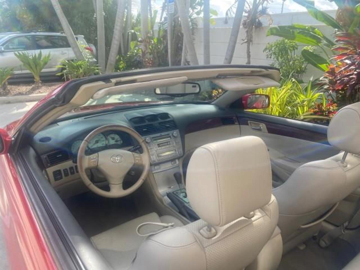 2005 Absolutely Red /Ivory Toyota Camry Solara SLE LOW MILES 63,889 (4T1FA38P85U) with an 3.3L DOHC SEFI VVT-i 24-Valve V6 Engine engine, Automatic transmission, located at 4701 North Dixie Hwy, Pompano Beach, FL, 33064, (954) 422-2889, 26.240938, -80.123474 - OUR WEBPAGE FLORIDACARS1.COM HAS OVER 100 PHOTOS AND FREE CARFAX LINK 2005 TOYOTA CAMRY SOLARA SLE V6 LOADED TOP OF THE LINE VIN: 4T1FA38P85U063157 4 T 1 F A 3 8 P 8 5 U 0 6 3 1 5 7 CONVERTIBLE 3.3L V6 F DOHC 24V GASOLINE FRONT WHEEL DRIVE Features ABS Brakes Air Conditioning Alloy Wheels AM/FM Ster - Photo#51