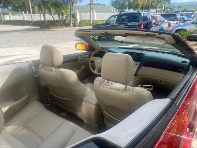 2005 Absolutely Red /Ivory Toyota Camry Solara SLE LOW MILES 63,889 (4T1FA38P85U) with an 3.3L DOHC SEFI VVT-i 24-Valve V6 Engine engine, Automatic transmission, located at 4701 North Dixie Hwy, Pompano Beach, FL, 33064, (954) 422-2889, 26.240938, -80.123474 - OUR WEBPAGE FLORIDACARS1.COM HAS OVER 100 PHOTOS AND FREE CARFAX LINK 2005 TOYOTA CAMRY SOLARA SLE V6 LOADED TOP OF THE LINE VIN: 4T1FA38P85U063157 4 T 1 F A 3 8 P 8 5 U 0 6 3 1 5 7 CONVERTIBLE 3.3L V6 F DOHC 24V GASOLINE FRONT WHEEL DRIVE Features ABS Brakes Air Conditioning Alloy Wheels AM/FM Ster - Photo#55