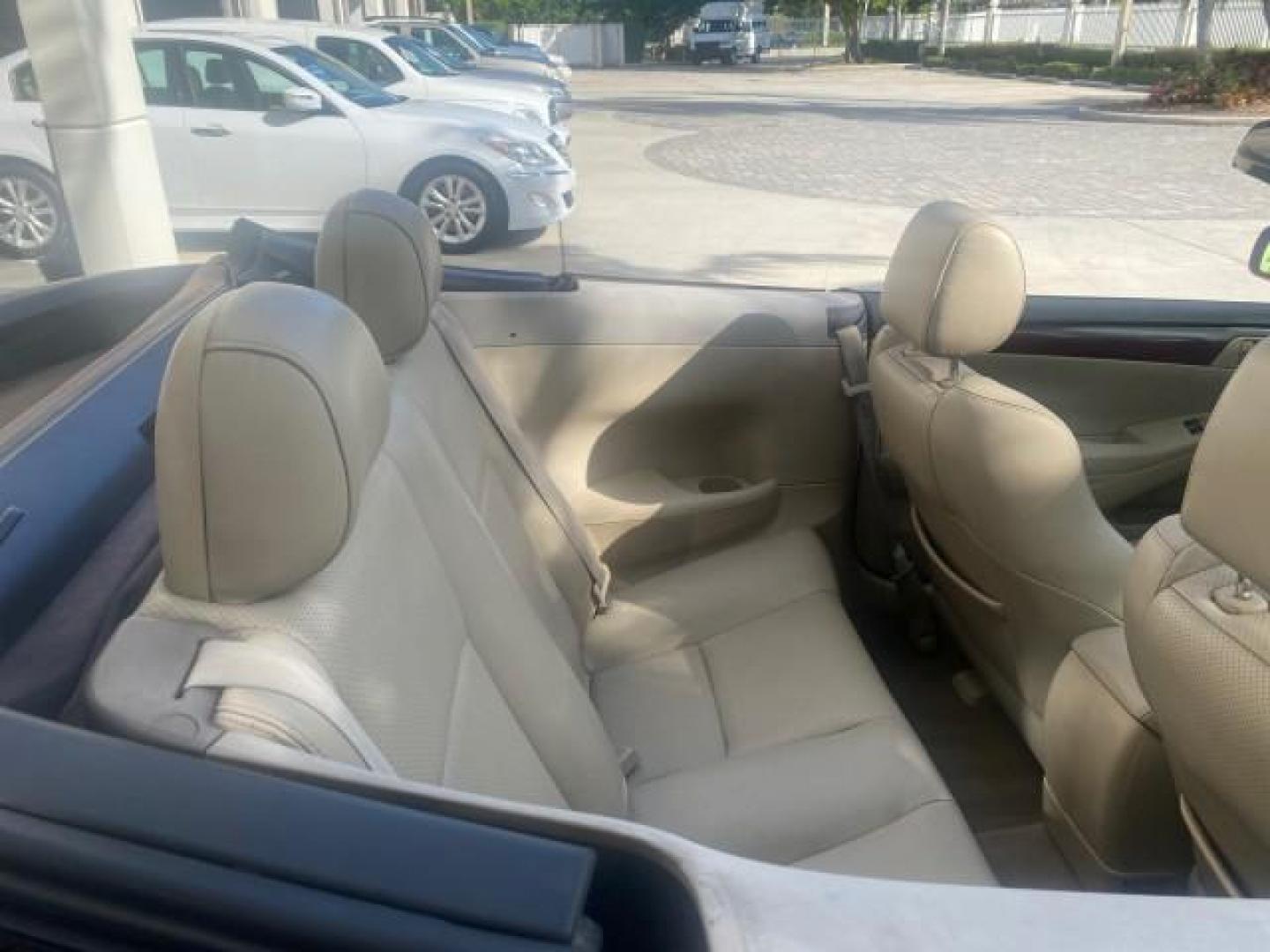 2005 Absolutely Red /Ivory Toyota Camry Solara SLE LOW MILES 63,889 (4T1FA38P85U) with an 3.3L DOHC SEFI VVT-i 24-Valve V6 Engine engine, Automatic transmission, located at 4701 North Dixie Hwy, Pompano Beach, FL, 33064, (954) 422-2889, 26.240938, -80.123474 - OUR WEBPAGE FLORIDACARS1.COM HAS OVER 100 PHOTOS AND FREE CARFAX LINK 2005 TOYOTA CAMRY SOLARA SLE V6 LOADED TOP OF THE LINE VIN: 4T1FA38P85U063157 4 T 1 F A 3 8 P 8 5 U 0 6 3 1 5 7 CONVERTIBLE 3.3L V6 F DOHC 24V GASOLINE FRONT WHEEL DRIVE Features ABS Brakes Air Conditioning Alloy Wheels AM/FM Ster - Photo#56