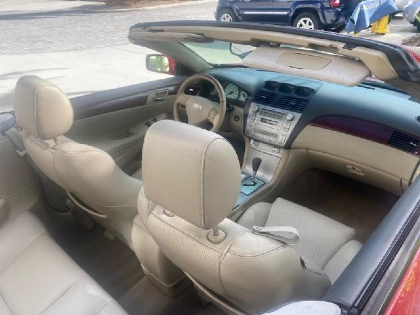 2005 Absolutely Red /Ivory Toyota Camry Solara SLE LOW MILES 63,889 (4T1FA38P85U) with an 3.3L DOHC SEFI VVT-i 24-Valve V6 Engine engine, Automatic transmission, located at 4701 North Dixie Hwy, Pompano Beach, FL, 33064, (954) 422-2889, 26.240938, -80.123474 - OUR WEBPAGE FLORIDACARS1.COM HAS OVER 100 PHOTOS AND FREE CARFAX LINK 2005 TOYOTA CAMRY SOLARA SLE V6 LOADED TOP OF THE LINE VIN: 4T1FA38P85U063157 4 T 1 F A 3 8 P 8 5 U 0 6 3 1 5 7 CONVERTIBLE 3.3L V6 F DOHC 24V GASOLINE FRONT WHEEL DRIVE Features ABS Brakes Air Conditioning Alloy Wheels AM/FM Ster - Photo#57