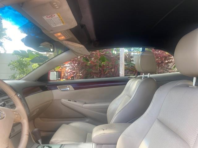 2005 Absolutely Red /Ivory Toyota Camry Solara SLE LOW MILES 63,889 (4T1FA38P85U) with an 3.3L DOHC SEFI VVT-i 24-Valve V6 Engine engine, Automatic transmission, located at 4701 North Dixie Hwy, Pompano Beach, FL, 33064, (954) 422-2889, 26.240938, -80.123474 - OUR WEBPAGE FLORIDACARS1.COM HAS OVER 100 PHOTOS AND FREE CARFAX LINK 2005 TOYOTA CAMRY SOLARA SLE V6 LOADED TOP OF THE LINE VIN: 4T1FA38P85U063157 4 T 1 F A 3 8 P 8 5 U 0 6 3 1 5 7 CONVERTIBLE 3.3L V6 F DOHC 24V GASOLINE FRONT WHEEL DRIVE Features ABS Brakes Air Conditioning Alloy Wheels AM/FM Ster - Photo#66