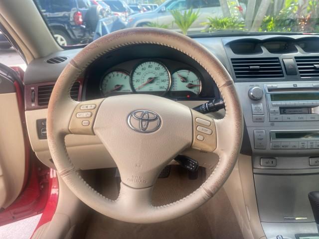 2005 Absolutely Red /Ivory Toyota Camry Solara SLE LOW MILES 63,889 (4T1FA38P85U) with an 3.3L DOHC SEFI VVT-i 24-Valve V6 Engine engine, Automatic transmission, located at 4701 North Dixie Hwy, Pompano Beach, FL, 33064, (954) 422-2889, 26.240938, -80.123474 - OUR WEBPAGE FLORIDACARS1.COM HAS OVER 100 PHOTOS AND FREE CARFAX LINK 2005 TOYOTA CAMRY SOLARA SLE V6 LOADED TOP OF THE LINE VIN: 4T1FA38P85U063157 4 T 1 F A 3 8 P 8 5 U 0 6 3 1 5 7 CONVERTIBLE 3.3L V6 F DOHC 24V GASOLINE FRONT WHEEL DRIVE Features ABS Brakes Air Conditioning Alloy Wheels AM/FM Ster - Photo#69