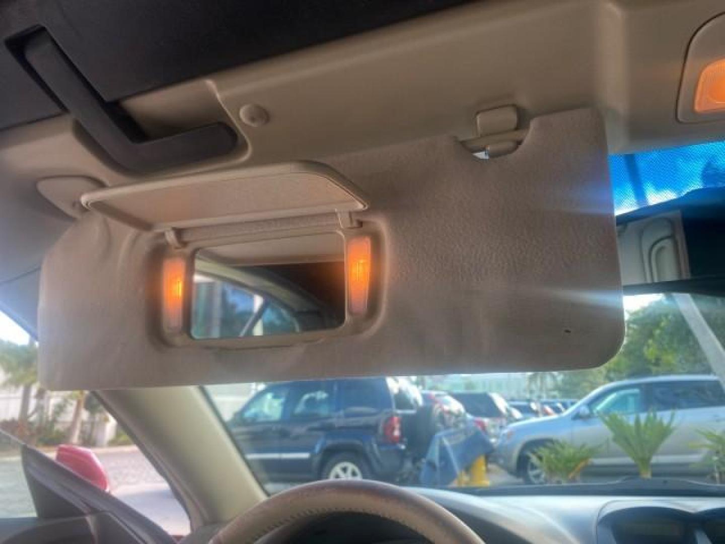 2005 Absolutely Red /Ivory Toyota Camry Solara SLE LOW MILES 63,889 (4T1FA38P85U) with an 3.3L DOHC SEFI VVT-i 24-Valve V6 Engine engine, Automatic transmission, located at 4701 North Dixie Hwy, Pompano Beach, FL, 33064, (954) 422-2889, 26.240938, -80.123474 - OUR WEBPAGE FLORIDACARS1.COM HAS OVER 100 PHOTOS AND FREE CARFAX LINK 2005 TOYOTA CAMRY SOLARA SLE V6 LOADED TOP OF THE LINE VIN: 4T1FA38P85U063157 4 T 1 F A 3 8 P 8 5 U 0 6 3 1 5 7 CONVERTIBLE 3.3L V6 F DOHC 24V GASOLINE FRONT WHEEL DRIVE Features ABS Brakes Air Conditioning Alloy Wheels AM/FM Ster - Photo#90