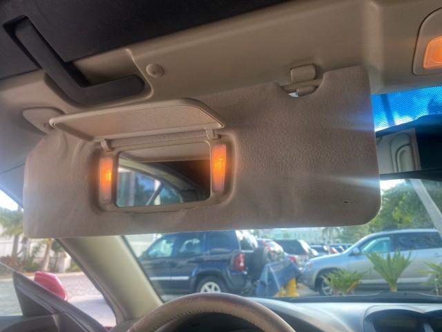 2005 Absolutely Red /Ivory Toyota Camry Solara SLE LOW MILES 63,889 (4T1FA38P85U) with an 3.3L DOHC SEFI VVT-i 24-Valve V6 Engine engine, Automatic transmission, located at 4701 North Dixie Hwy, Pompano Beach, FL, 33064, (954) 422-2889, 26.240938, -80.123474 - OUR WEBPAGE FLORIDACARS1.COM HAS OVER 100 PHOTOS AND FREE CARFAX LINK 2005 TOYOTA CAMRY SOLARA SLE V6 LOADED TOP OF THE LINE VIN: 4T1FA38P85U063157 4 T 1 F A 3 8 P 8 5 U 0 6 3 1 5 7 CONVERTIBLE 3.3L V6 F DOHC 24V GASOLINE FRONT WHEEL DRIVE Features ABS Brakes Air Conditioning Alloy Wheels AM/FM Ster - Photo#90