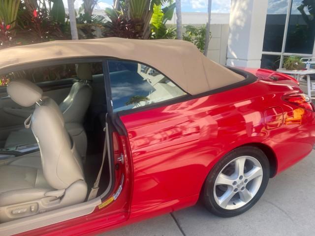 2005 Absolutely Red /Ivory Toyota Camry Solara SLE LOW MILES 63,889 (4T1FA38P85U) with an 3.3L DOHC SEFI VVT-i 24-Valve V6 Engine engine, Automatic transmission, located at 4701 North Dixie Hwy, Pompano Beach, FL, 33064, (954) 422-2889, 26.240938, -80.123474 - OUR WEBPAGE FLORIDACARS1.COM HAS OVER 100 PHOTOS AND FREE CARFAX LINK 2005 TOYOTA CAMRY SOLARA SLE V6 LOADED TOP OF THE LINE VIN: 4T1FA38P85U063157 4 T 1 F A 3 8 P 8 5 U 0 6 3 1 5 7 CONVERTIBLE 3.3L V6 F DOHC 24V GASOLINE FRONT WHEEL DRIVE Features ABS Brakes Air Conditioning Alloy Wheels AM/FM Ster - Photo#93