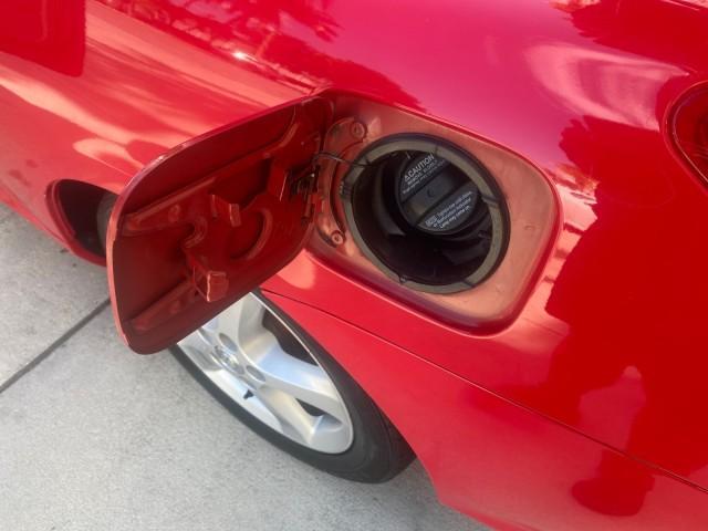 2005 Absolutely Red /Ivory Toyota Camry Solara SLE LOW MILES 63,889 (4T1FA38P85U) with an 3.3L DOHC SEFI VVT-i 24-Valve V6 Engine engine, Automatic transmission, located at 4701 North Dixie Hwy, Pompano Beach, FL, 33064, (954) 422-2889, 26.240938, -80.123474 - OUR WEBPAGE FLORIDACARS1.COM HAS OVER 100 PHOTOS AND FREE CARFAX LINK 2005 TOYOTA CAMRY SOLARA SLE V6 LOADED TOP OF THE LINE VIN: 4T1FA38P85U063157 4 T 1 F A 3 8 P 8 5 U 0 6 3 1 5 7 CONVERTIBLE 3.3L V6 F DOHC 24V GASOLINE FRONT WHEEL DRIVE Features ABS Brakes Air Conditioning Alloy Wheels AM/FM Ster - Photo#98