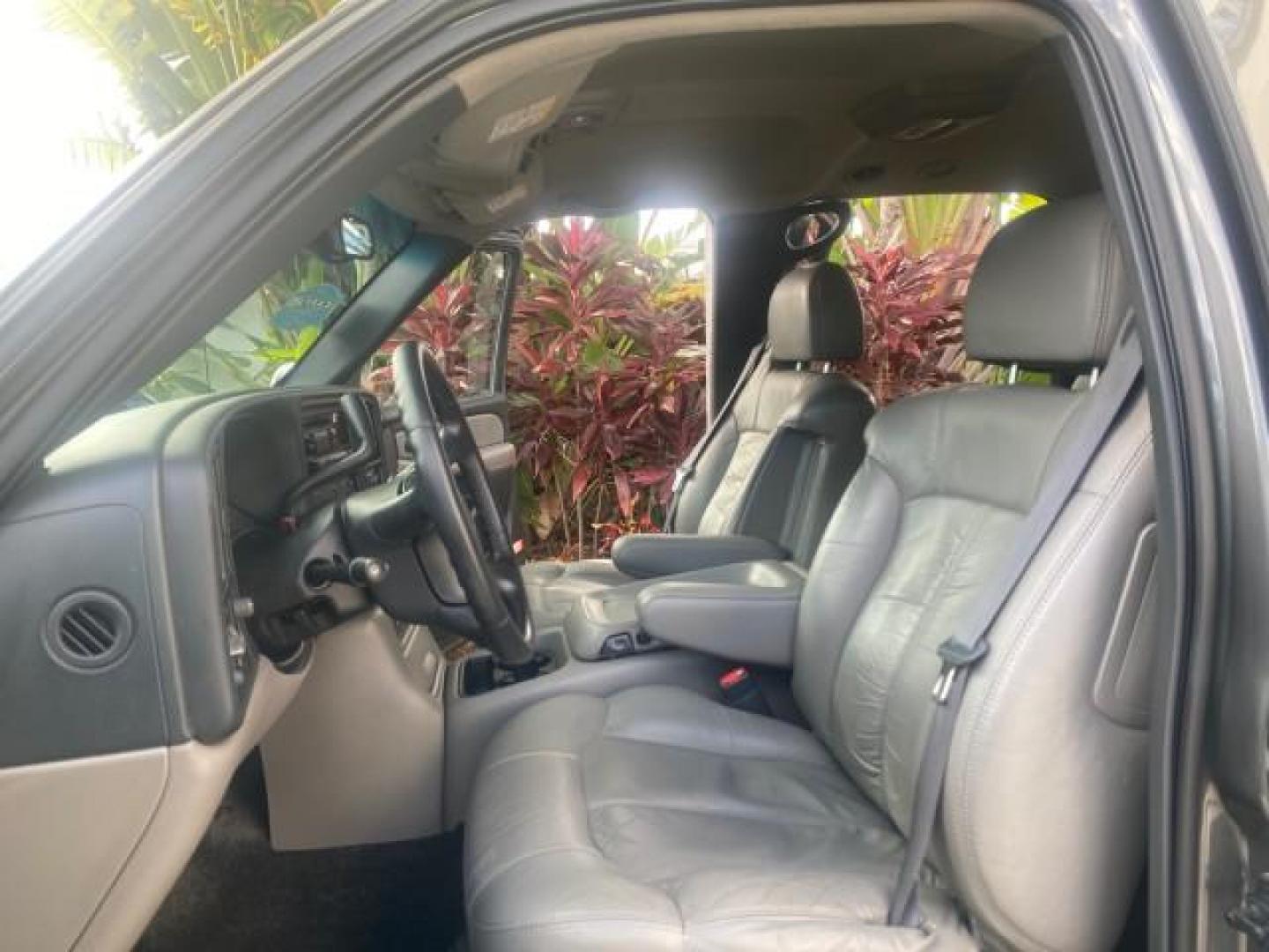 2002 Medium Charcoal Gray Metalli /Graphite/Medium Gray Chevrolet Suburban LT LOW MILES 60,399 1 OWNER (3GNEC16T32G) with an 5.3L Vortec 1000 SFI V8 Engine engine, Automatic transmission, located at 4701 North Dixie Hwy, Pompano Beach, FL, 33064, (954) 422-2889, 26.240938, -80.123474 - OUR WEBPAGE FLORIDACARS1.COM HAS OVER 100 PHOTOS AND FREE CARFAX LINK 2002 CHEVROLET SUBURBAN 1500 LT AUTORIDE VIN: 3GNEC16T32G235731 3 G N E C 1 6 T 3 2 G 2 3 5 7 3 1 4 DOOR WAGON/SPORT UTILITY 5.3L V8 F OHV GASOLINE REAR WHEEL DRIVE TOW PKG Features ABS Brakes Air Conditioning Alloy Wheels AM/FM S - Photo#10