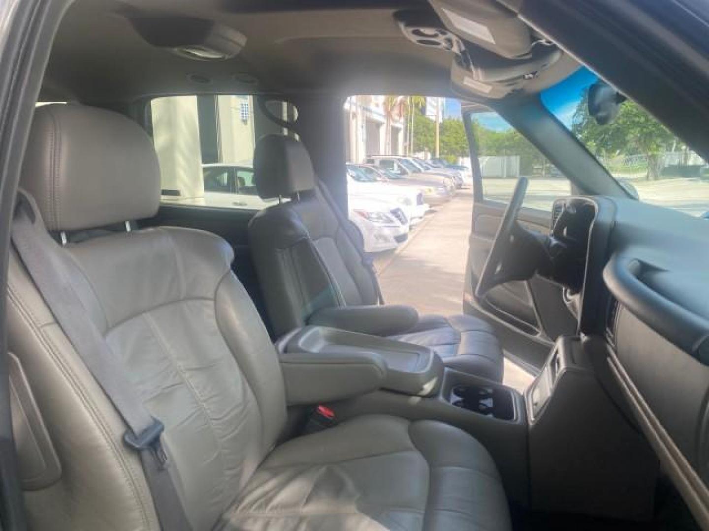 2002 Medium Charcoal Gray Metalli /Graphite/Medium Gray Chevrolet Suburban LT LOW MILES 60,399 1 OWNER (3GNEC16T32G) with an 5.3L Vortec 1000 SFI V8 Engine engine, Automatic transmission, located at 4701 North Dixie Hwy, Pompano Beach, FL, 33064, (954) 422-2889, 26.240938, -80.123474 - OUR WEBPAGE FLORIDACARS1.COM HAS OVER 100 PHOTOS AND FREE CARFAX LINK 2002 CHEVROLET SUBURBAN 1500 LT AUTORIDE VIN: 3GNEC16T32G235731 3 G N E C 1 6 T 3 2 G 2 3 5 7 3 1 4 DOOR WAGON/SPORT UTILITY 5.3L V8 F OHV GASOLINE REAR WHEEL DRIVE TOW PKG Features ABS Brakes Air Conditioning Alloy Wheels AM/FM S - Photo#12