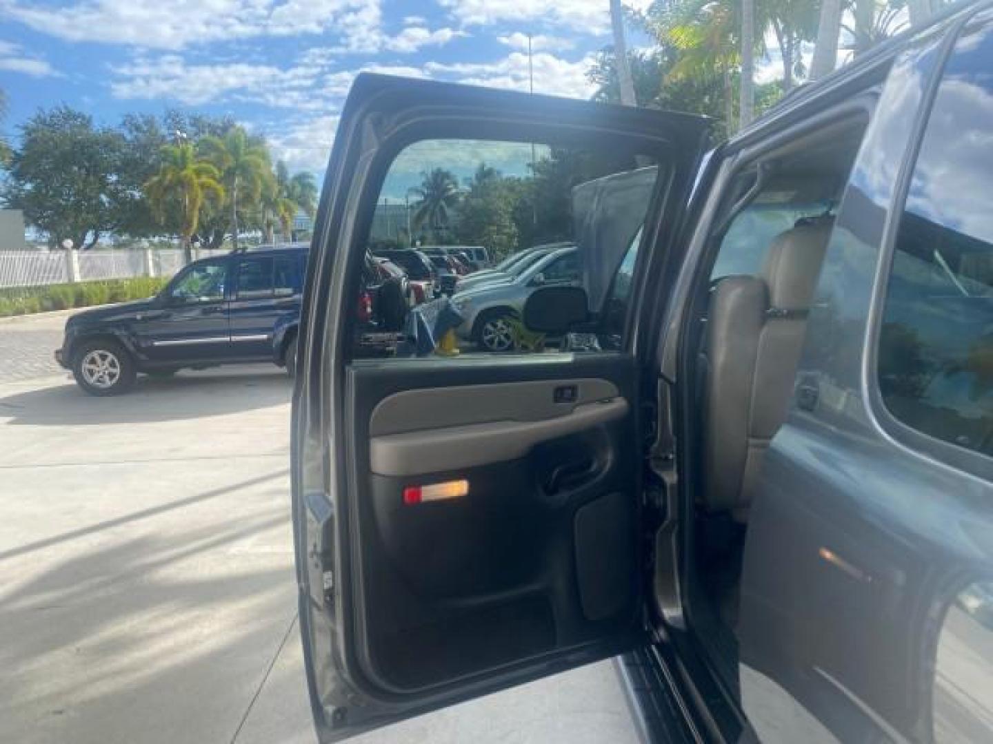 2002 Medium Charcoal Gray Metalli /Graphite/Medium Gray Chevrolet Suburban LT LOW MILES 60,399 1 OWNER (3GNEC16T32G) with an 5.3L Vortec 1000 SFI V8 Engine engine, Automatic transmission, located at 4701 North Dixie Hwy, Pompano Beach, FL, 33064, (954) 422-2889, 26.240938, -80.123474 - OUR WEBPAGE FLORIDACARS1.COM HAS OVER 100 PHOTOS AND FREE CARFAX LINK 2002 CHEVROLET SUBURBAN 1500 LT AUTORIDE VIN: 3GNEC16T32G235731 3 G N E C 1 6 T 3 2 G 2 3 5 7 3 1 4 DOOR WAGON/SPORT UTILITY 5.3L V8 F OHV GASOLINE REAR WHEEL DRIVE TOW PKG Features ABS Brakes Air Conditioning Alloy Wheels AM/FM S - Photo#13