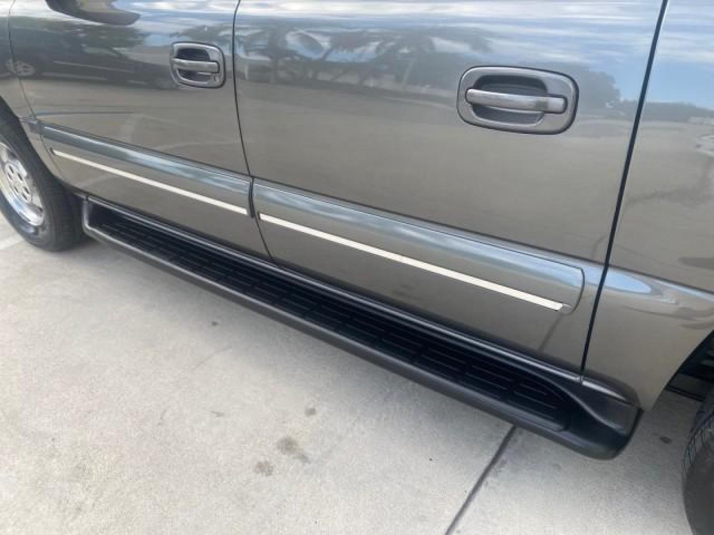 2002 Medium Charcoal Gray Metalli /Graphite/Medium Gray Chevrolet Suburban LT LOW MILES 60,399 1 OWNER (3GNEC16T32G) with an 5.3L Vortec 1000 SFI V8 Engine engine, Automatic transmission, located at 4701 North Dixie Hwy, Pompano Beach, FL, 33064, (954) 422-2889, 26.240938, -80.123474 - OUR WEBPAGE FLORIDACARS1.COM HAS OVER 100 PHOTOS AND FREE CARFAX LINK 2002 CHEVROLET SUBURBAN 1500 LT AUTORIDE VIN: 3GNEC16T32G235731 3 G N E C 1 6 T 3 2 G 2 3 5 7 3 1 4 DOOR WAGON/SPORT UTILITY 5.3L V8 F OHV GASOLINE REAR WHEEL DRIVE TOW PKG Features ABS Brakes Air Conditioning Alloy Wheels AM/FM S - Photo#70