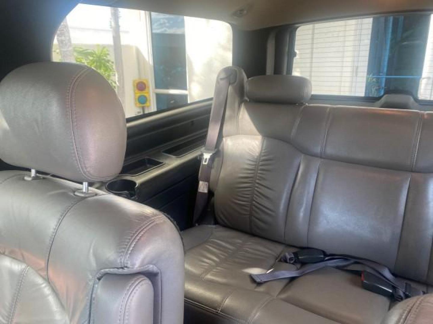 2002 Medium Charcoal Gray Metalli /Graphite/Medium Gray Chevrolet Suburban LT LOW MILES 60,399 1 OWNER (3GNEC16T32G) with an 5.3L Vortec 1000 SFI V8 Engine engine, Automatic transmission, located at 4701 North Dixie Hwy, Pompano Beach, FL, 33064, (954) 422-2889, 26.240938, -80.123474 - OUR WEBPAGE FLORIDACARS1.COM HAS OVER 100 PHOTOS AND FREE CARFAX LINK 2002 CHEVROLET SUBURBAN 1500 LT AUTORIDE VIN: 3GNEC16T32G235731 3 G N E C 1 6 T 3 2 G 2 3 5 7 3 1 4 DOOR WAGON/SPORT UTILITY 5.3L V8 F OHV GASOLINE REAR WHEEL DRIVE TOW PKG Features ABS Brakes Air Conditioning Alloy Wheels AM/FM S - Photo#86