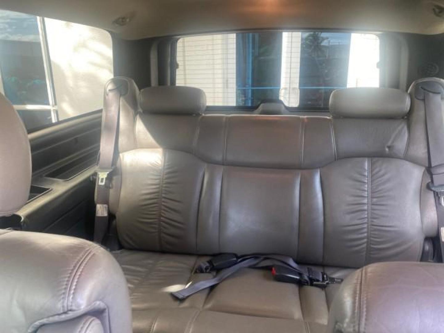 2002 Medium Charcoal Gray Metalli /Graphite/Medium Gray Chevrolet Suburban LT LOW MILES 60,399 1 OWNER (3GNEC16T32G) with an 5.3L Vortec 1000 SFI V8 Engine engine, Automatic transmission, located at 4701 North Dixie Hwy, Pompano Beach, FL, 33064, (954) 422-2889, 26.240938, -80.123474 - OUR WEBPAGE FLORIDACARS1.COM HAS OVER 100 PHOTOS AND FREE CARFAX LINK 2002 CHEVROLET SUBURBAN 1500 LT AUTORIDE VIN: 3GNEC16T32G235731 3 G N E C 1 6 T 3 2 G 2 3 5 7 3 1 4 DOOR WAGON/SPORT UTILITY 5.3L V8 F OHV GASOLINE REAR WHEEL DRIVE TOW PKG Features ABS Brakes Air Conditioning Alloy Wheels AM/FM S - Photo#87