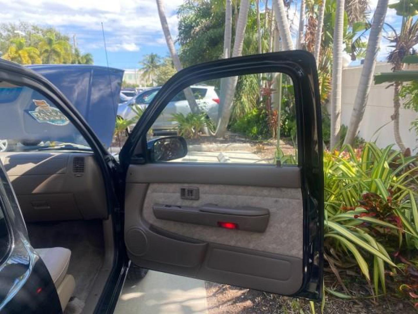 2000 Black Sand Pearl /Oak Toyota Tacoma LOW MILES 74,047 1 OWNER (4TAVL52N2YZ) with an 2.4L DOHC EFI 16-Valve I4 Engine engine, Automatic transmission, located at 4701 North Dixie Hwy, Pompano Beach, FL, 33064, (954) 422-2889, 26.240938, -80.123474 - OUR WEBPAGE FLORIDACARS1.COM HAS OVER 100 PHOTOS AND FREE CARFAX LINK 2000 TOYOTA TACOMA SR5 VIN: 4TAVL52N2YZ618796 4 T A V L 5 2 N 2 Y Z 6 1 8 7 9 6 CLUB CAB PICKUP 2.4L I4 F DOHC GASOLINE 29 MPG REAR WHEEL DRIVE Features Air Conditioning AM/FM Stereo Automatic Transmission Bed Liner Cassette Playe - Photo#11