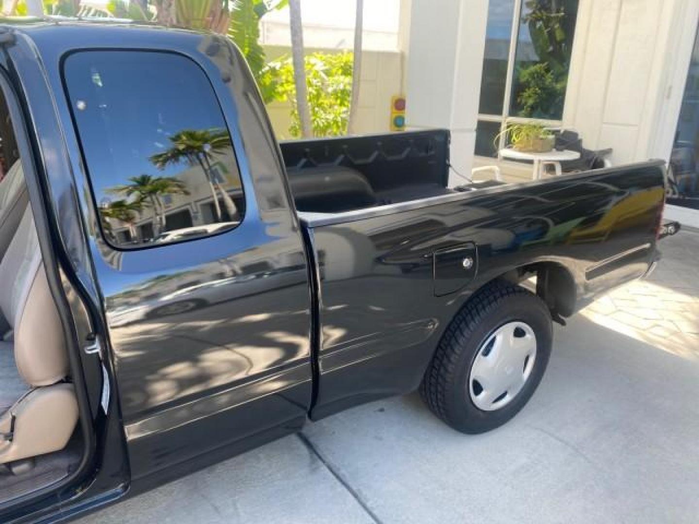 2000 Black Sand Pearl /Oak Toyota Tacoma LOW MILES 74,047 1 OWNER (4TAVL52N2YZ) with an 2.4L DOHC EFI 16-Valve I4 Engine engine, Automatic transmission, located at 4701 North Dixie Hwy, Pompano Beach, FL, 33064, (954) 422-2889, 26.240938, -80.123474 - OUR WEBPAGE FLORIDACARS1.COM HAS OVER 100 PHOTOS AND FREE CARFAX LINK 2000 TOYOTA TACOMA SR5 VIN: 4TAVL52N2YZ618796 4 T A V L 5 2 N 2 Y Z 6 1 8 7 9 6 CLUB CAB PICKUP 2.4L I4 F DOHC GASOLINE 29 MPG REAR WHEEL DRIVE Features Air Conditioning AM/FM Stereo Automatic Transmission Bed Liner Cassette Playe - Photo#13