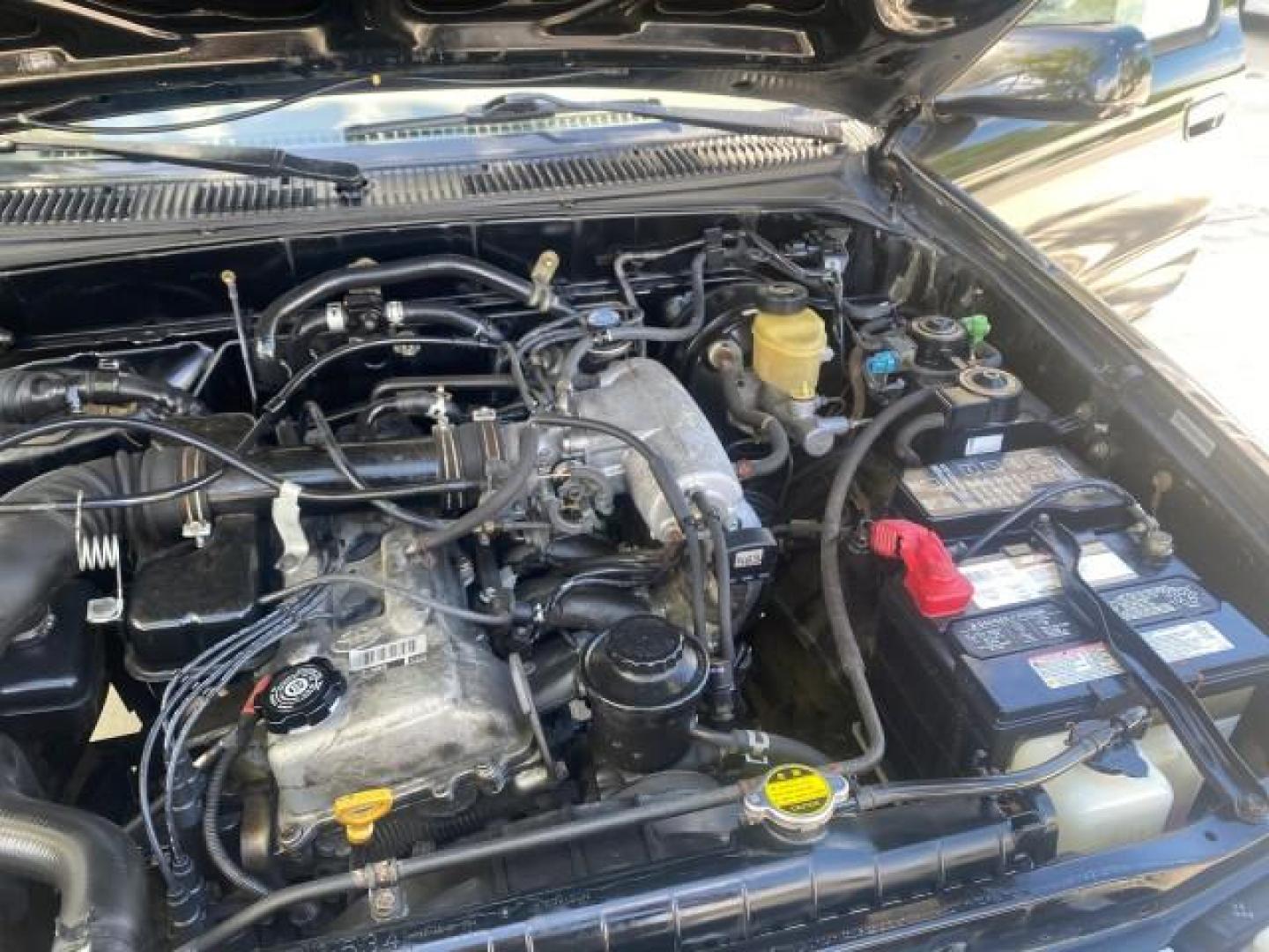 2000 Black Sand Pearl /Oak Toyota Tacoma LOW MILES 74,047 1 OWNER (4TAVL52N2YZ) with an 2.4L DOHC EFI 16-Valve I4 Engine engine, Automatic transmission, located at 4701 North Dixie Hwy, Pompano Beach, FL, 33064, (954) 422-2889, 26.240938, -80.123474 - OUR WEBPAGE FLORIDACARS1.COM HAS OVER 100 PHOTOS AND FREE CARFAX LINK 2000 TOYOTA TACOMA SR5 VIN: 4TAVL52N2YZ618796 4 T A V L 5 2 N 2 Y Z 6 1 8 7 9 6 CLUB CAB PICKUP 2.4L I4 F DOHC GASOLINE 29 MPG REAR WHEEL DRIVE Features Air Conditioning AM/FM Stereo Automatic Transmission Bed Liner Cassette Playe - Photo#26