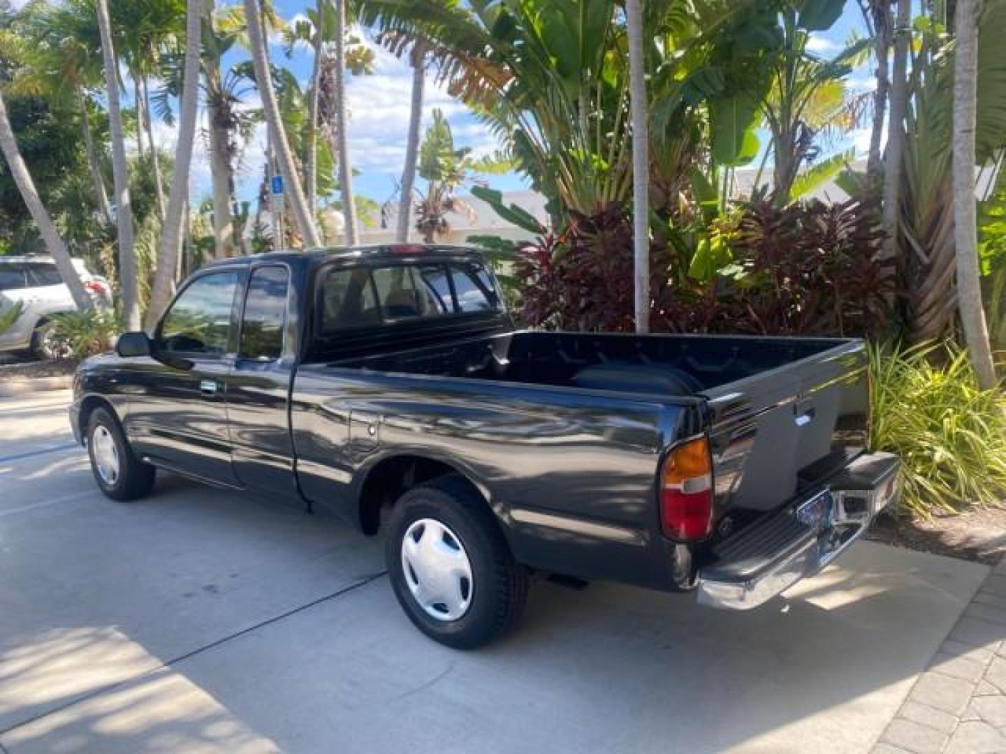 2000 Black Sand Pearl /Oak Toyota Tacoma LOW MILES 74,047 1 OWNER (4TAVL52N2YZ) with an 2.4L DOHC EFI 16-Valve I4 Engine engine, Automatic transmission, located at 4701 North Dixie Hwy, Pompano Beach, FL, 33064, (954) 422-2889, 26.240938, -80.123474 - OUR WEBPAGE FLORIDACARS1.COM HAS OVER 100 PHOTOS AND FREE CARFAX LINK 2000 TOYOTA TACOMA SR5 VIN: 4TAVL52N2YZ618796 4 T A V L 5 2 N 2 Y Z 6 1 8 7 9 6 CLUB CAB PICKUP 2.4L I4 F DOHC GASOLINE 29 MPG REAR WHEEL DRIVE Features Air Conditioning AM/FM Stereo Automatic Transmission Bed Liner Cassette Playe - Photo#35