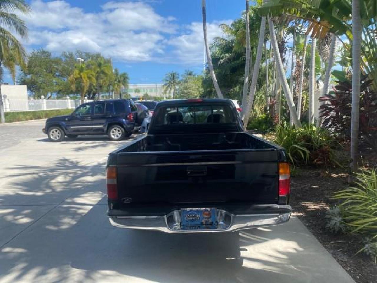 2000 Black Sand Pearl /Oak Toyota Tacoma LOW MILES 74,047 1 OWNER (4TAVL52N2YZ) with an 2.4L DOHC EFI 16-Valve I4 Engine engine, Automatic transmission, located at 4701 North Dixie Hwy, Pompano Beach, FL, 33064, (954) 422-2889, 26.240938, -80.123474 - OUR WEBPAGE FLORIDACARS1.COM HAS OVER 100 PHOTOS AND FREE CARFAX LINK 2000 TOYOTA TACOMA SR5 VIN: 4TAVL52N2YZ618796 4 T A V L 5 2 N 2 Y Z 6 1 8 7 9 6 CLUB CAB PICKUP 2.4L I4 F DOHC GASOLINE 29 MPG REAR WHEEL DRIVE Features Air Conditioning AM/FM Stereo Automatic Transmission Bed Liner Cassette Playe - Photo#37
