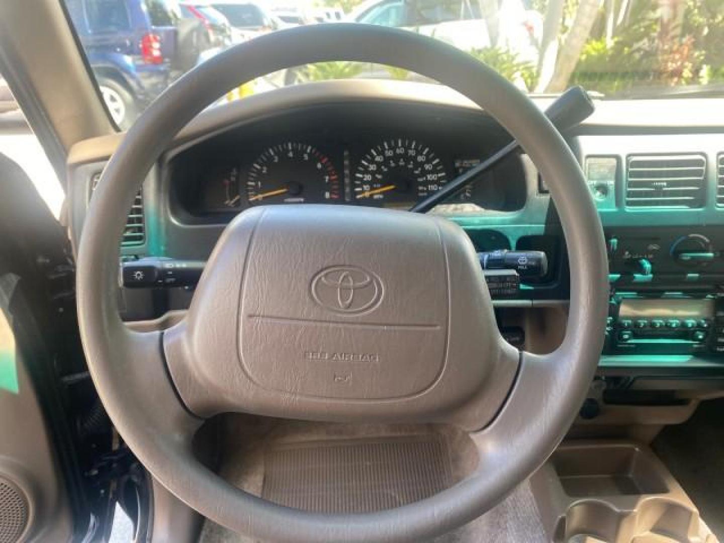 2000 Black Sand Pearl /Oak Toyota Tacoma LOW MILES 74,047 1 OWNER (4TAVL52N2YZ) with an 2.4L DOHC EFI 16-Valve I4 Engine engine, Automatic transmission, located at 4701 North Dixie Hwy, Pompano Beach, FL, 33064, (954) 422-2889, 26.240938, -80.123474 - OUR WEBPAGE FLORIDACARS1.COM HAS OVER 100 PHOTOS AND FREE CARFAX LINK 2000 TOYOTA TACOMA SR5 VIN: 4TAVL52N2YZ618796 4 T A V L 5 2 N 2 Y Z 6 1 8 7 9 6 CLUB CAB PICKUP 2.4L I4 F DOHC GASOLINE 29 MPG REAR WHEEL DRIVE Features Air Conditioning AM/FM Stereo Automatic Transmission Bed Liner Cassette Playe - Photo#50